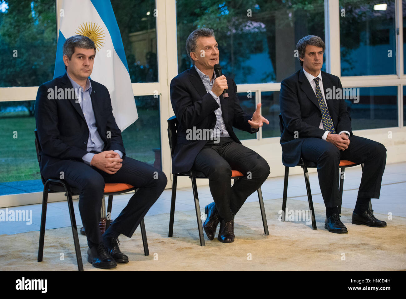Olivos, Argentina - May 6, 2016: President of Argentina Mauricio Macri (C), Finance Minister Alfonso Prat-Gay (R) and Cabinet Chief Marcos Pena (L). Stock Photo