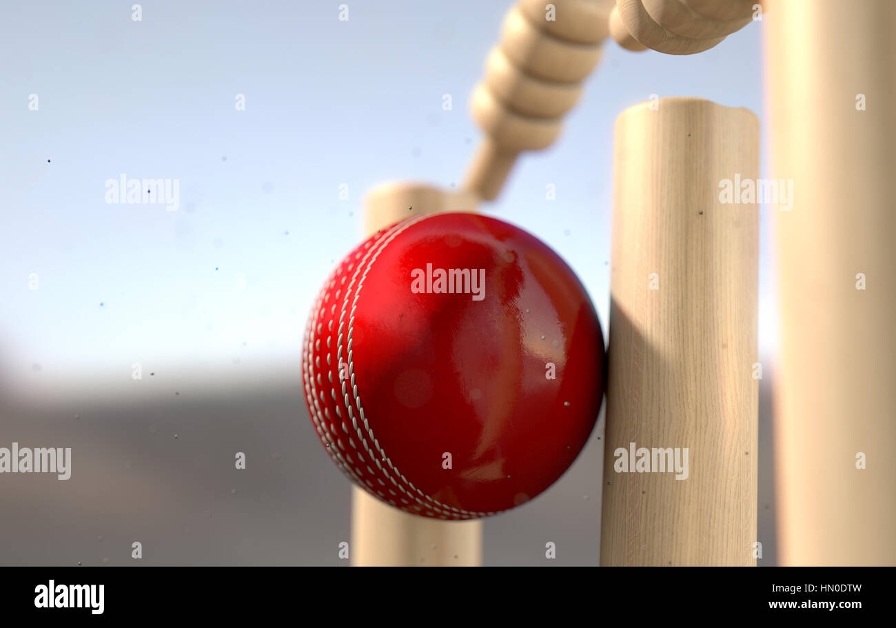 A close up of a red leather stitched cricket ball hitting wooden wickets with dirt particles emanating from the impact in the daytime - 3D render Stock Photo