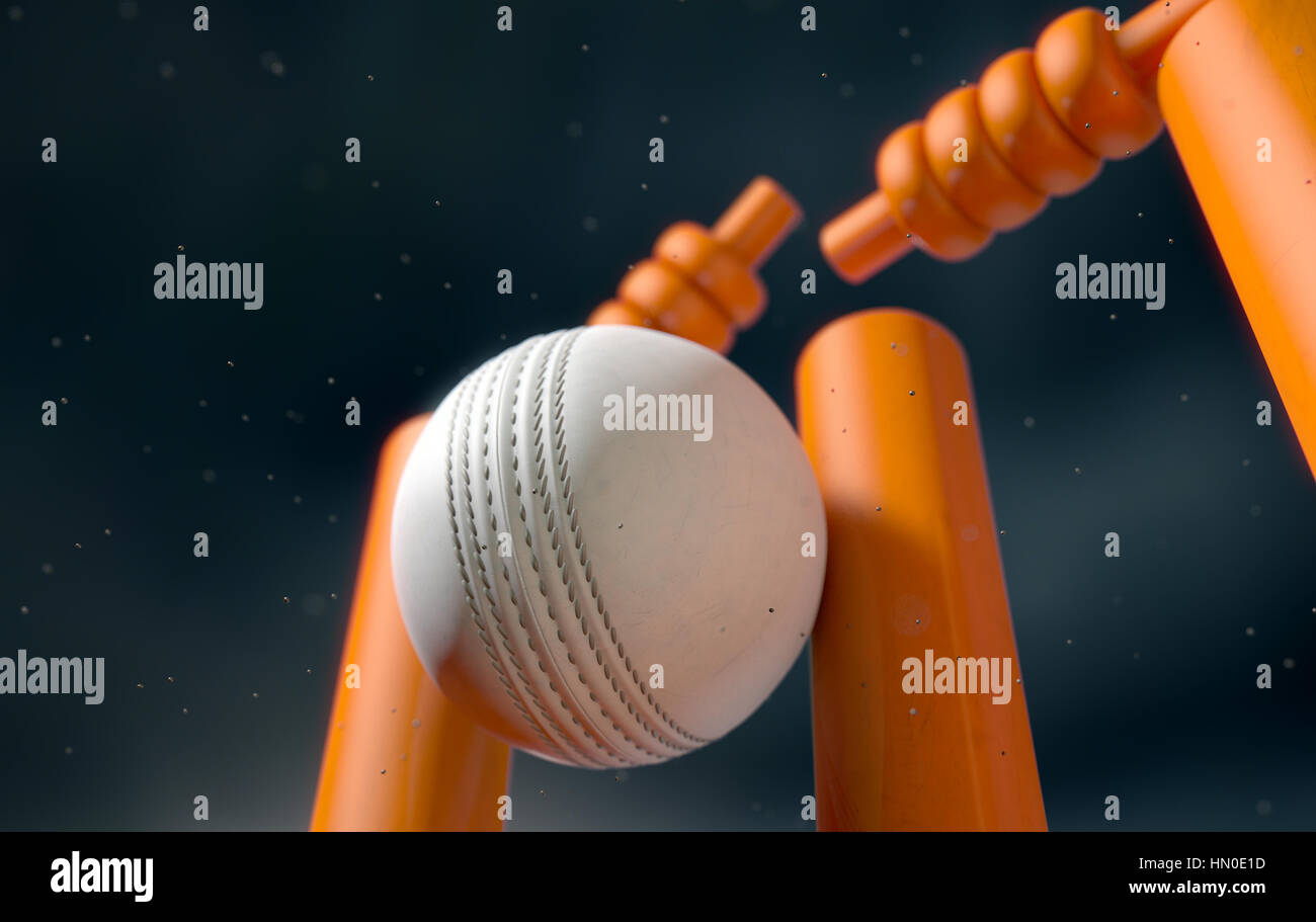 A close up of a white leather stitched cricket ball hitting orange wickets with dirt particles emanating from the impact at night - 3D render Stock Photo