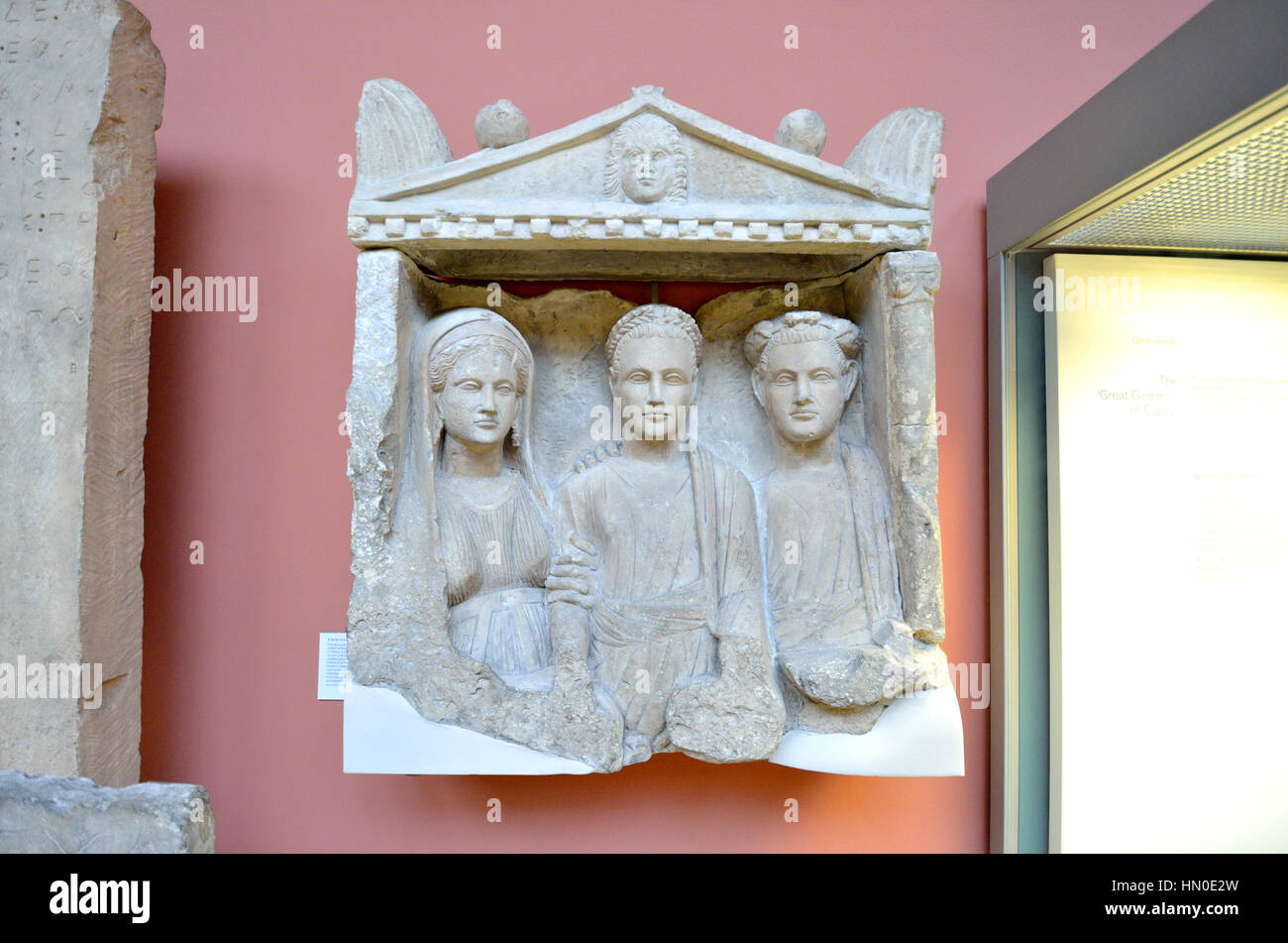 London, England, UK. British Museum. A family in mourning (dead man in the centre) 200-100BC from Tremetousha, Cyprus. Stock Photo