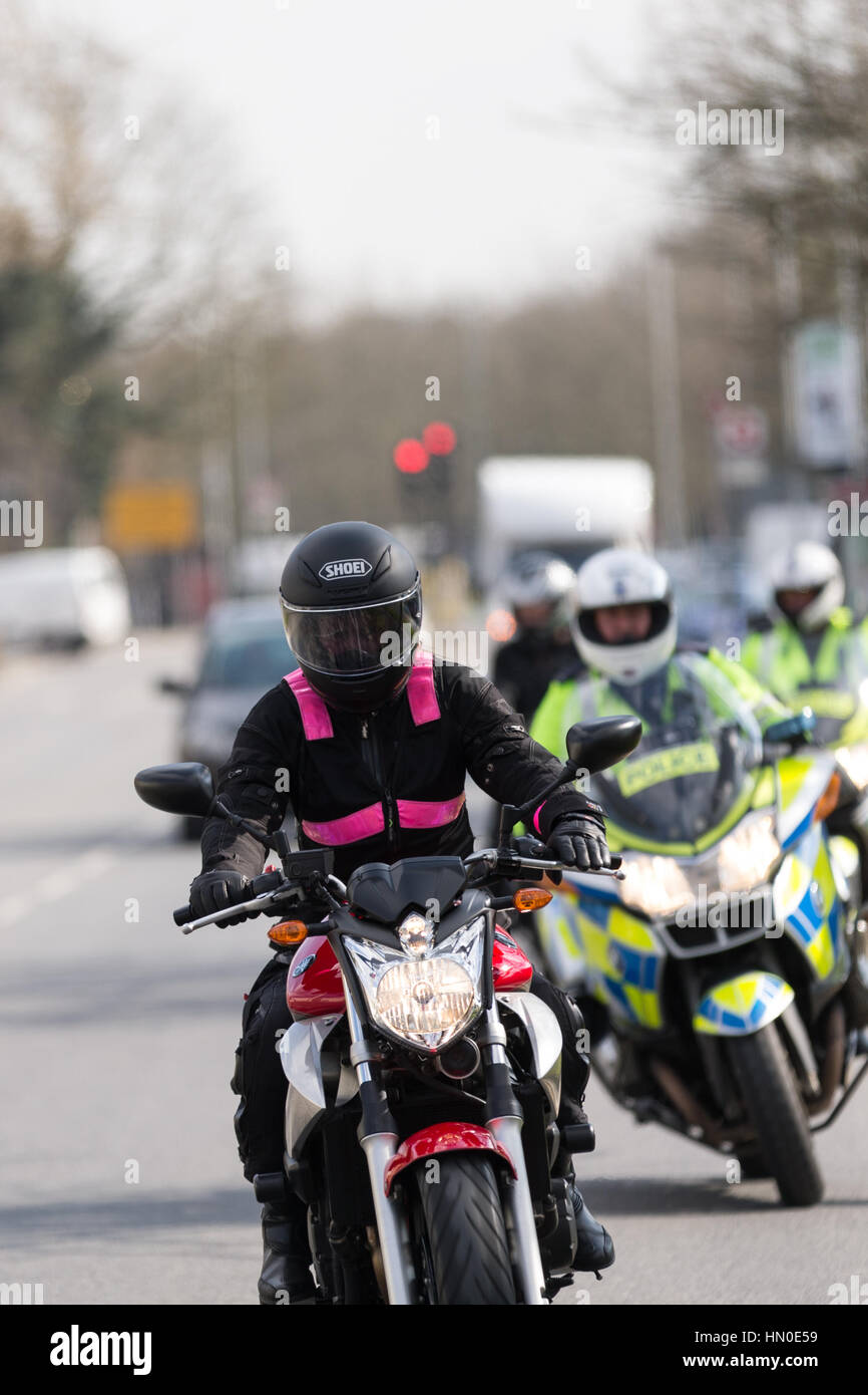 Motorcylists attend a BikeSafe training day where they are shown the safest way to ride on a variety of roads and junctions by Met Police riders, Midd Stock Photo