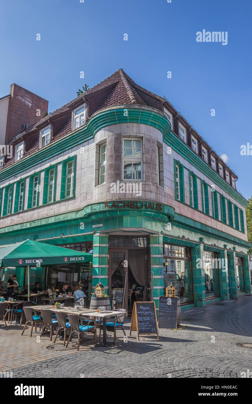 Historical cafe Kachelhaus with people enjoying the sun in Bielefeld
