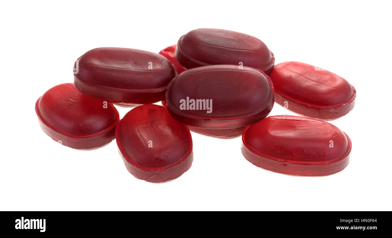 Cherry flavored menthol cough drops isolated on a white background