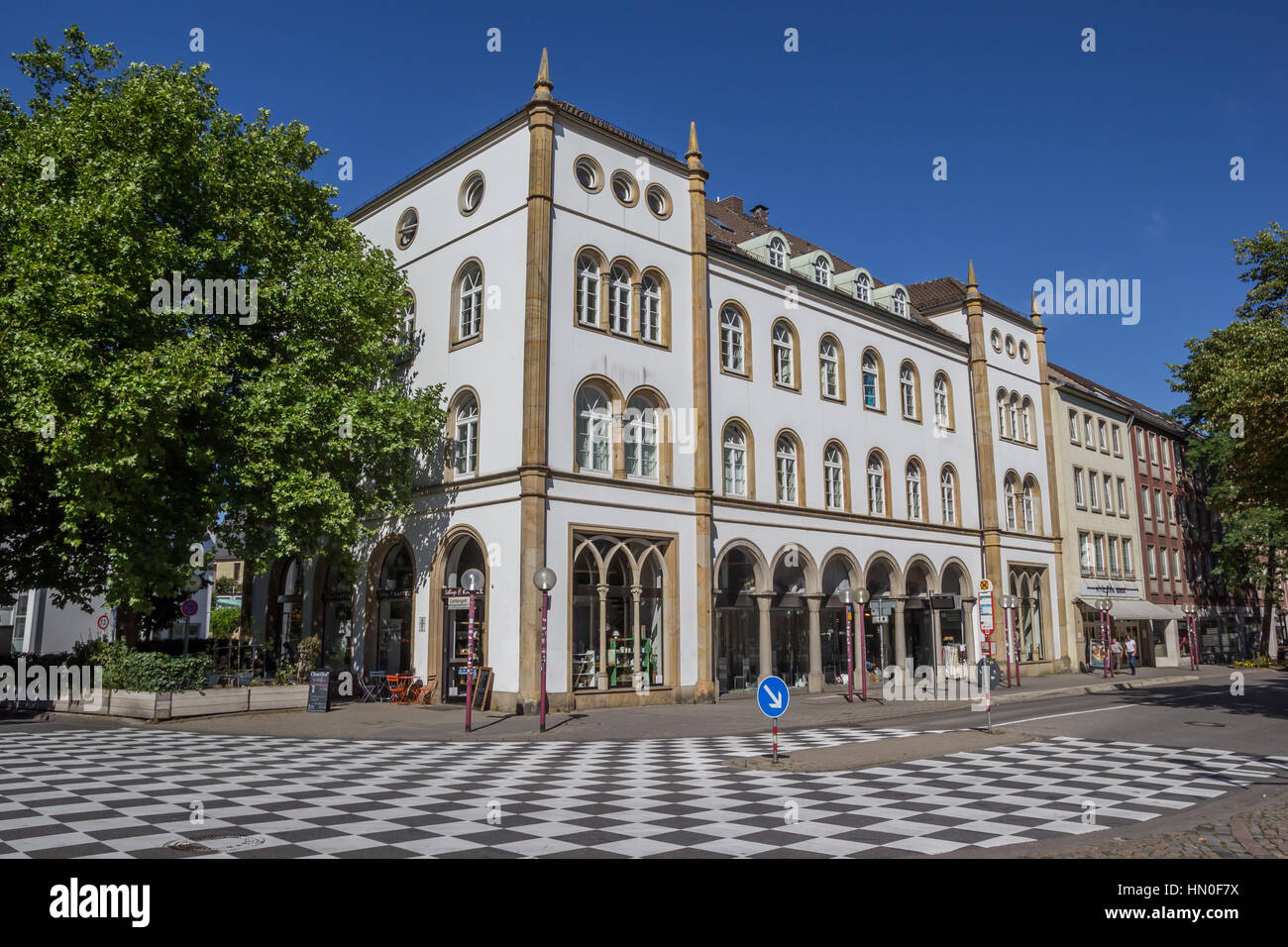 Checkerboard pattern in front of an old building in Osnabruck, Germany ...