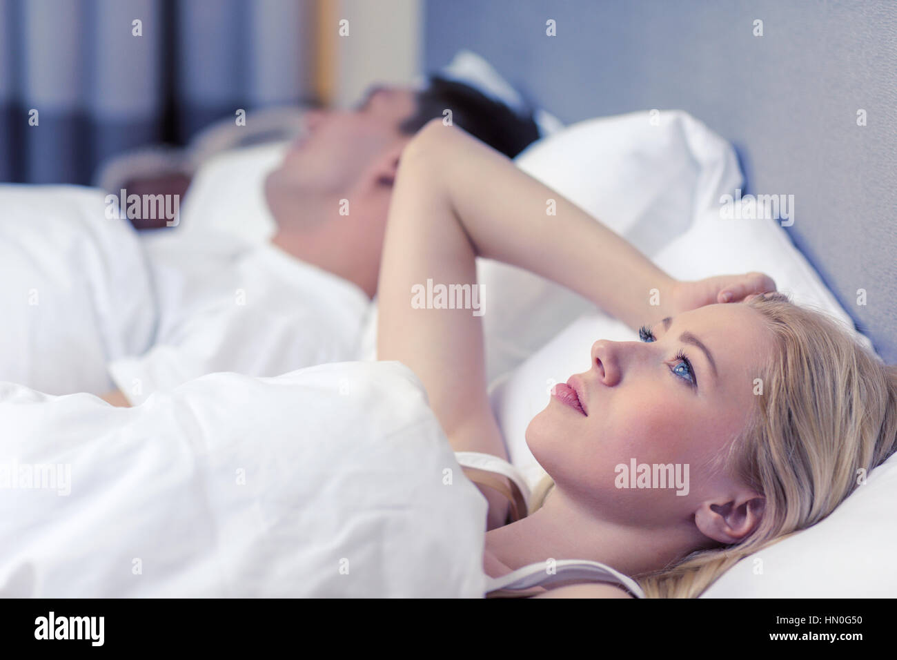 happy couple sleeping in bed Stock Photo - Alamy