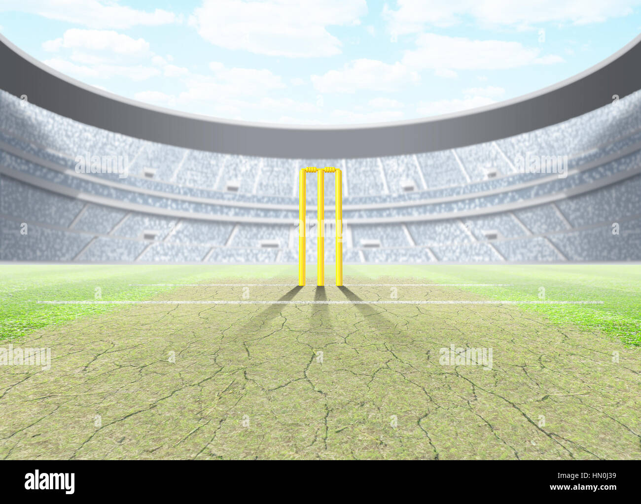 A generic seated cricket stadium with cracked pitch and yellow wickets a green grass pitch in