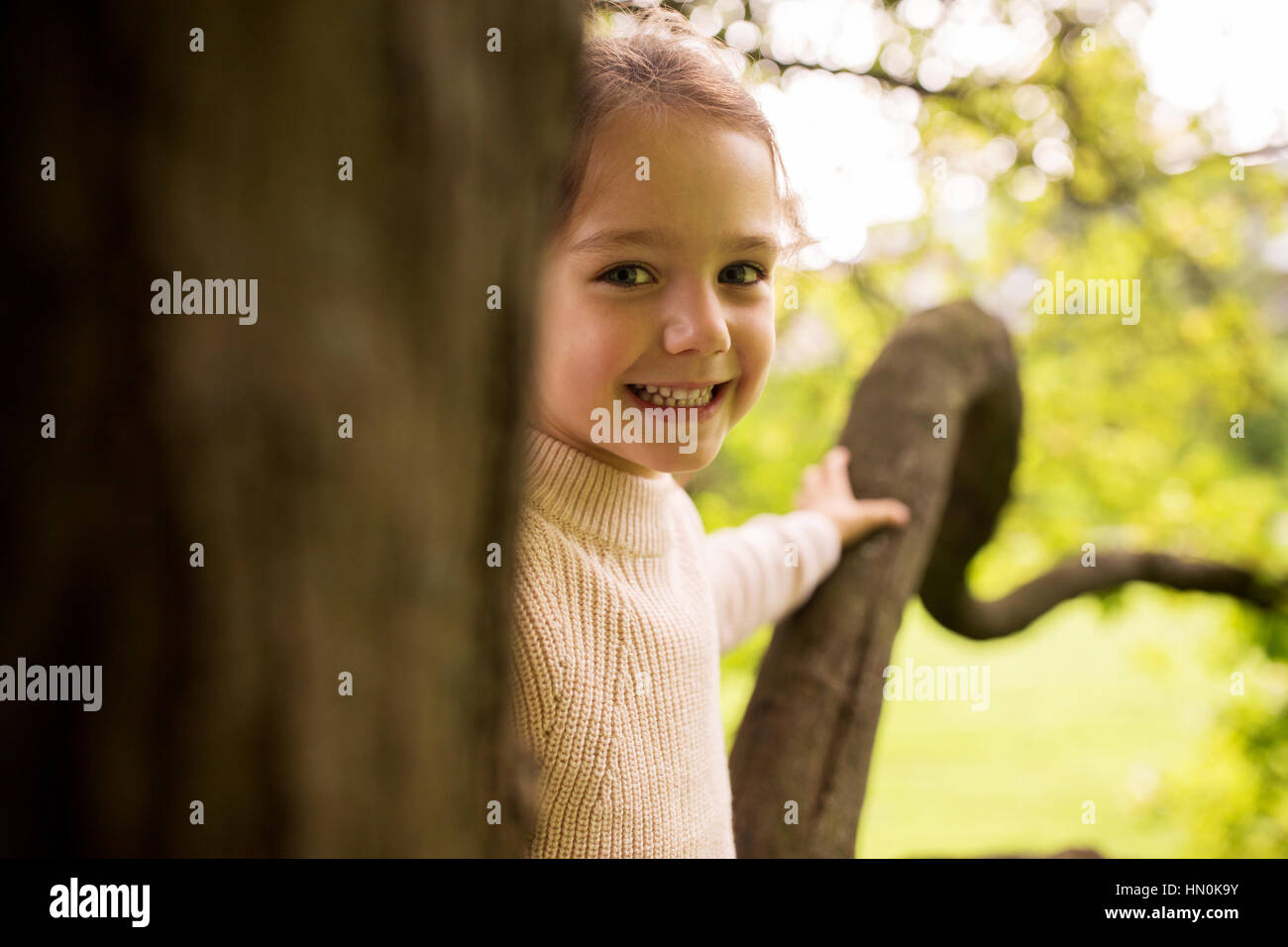 happy beautiful little girl portrait outdoors Stock Photo - Alamy