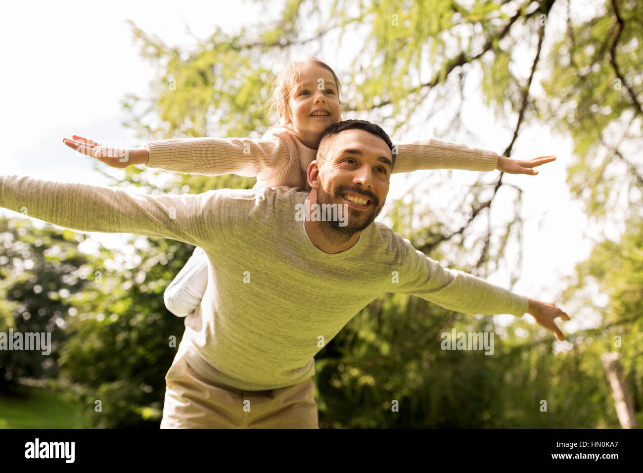 happy family having fun in summer park Stock Photo