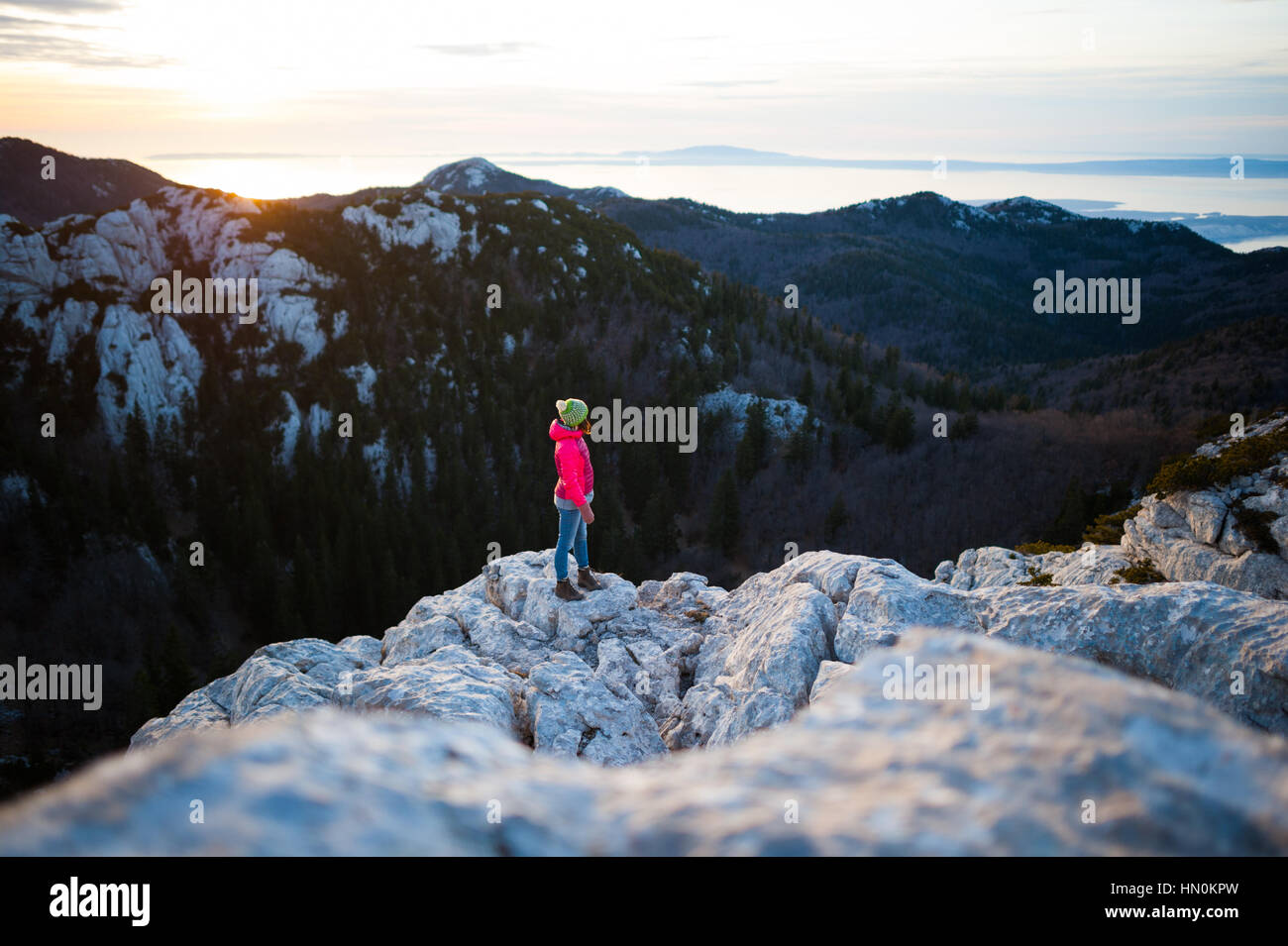 Standing on sea cliff sunset hi-res stock photography and images - Alamy