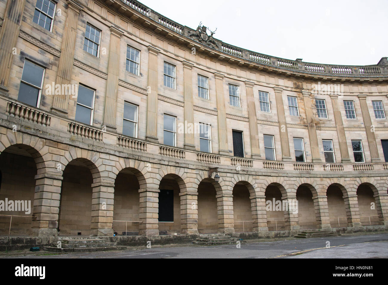 The arches and windows of Buxton Crescent, Buxton, Derbyshire Stock