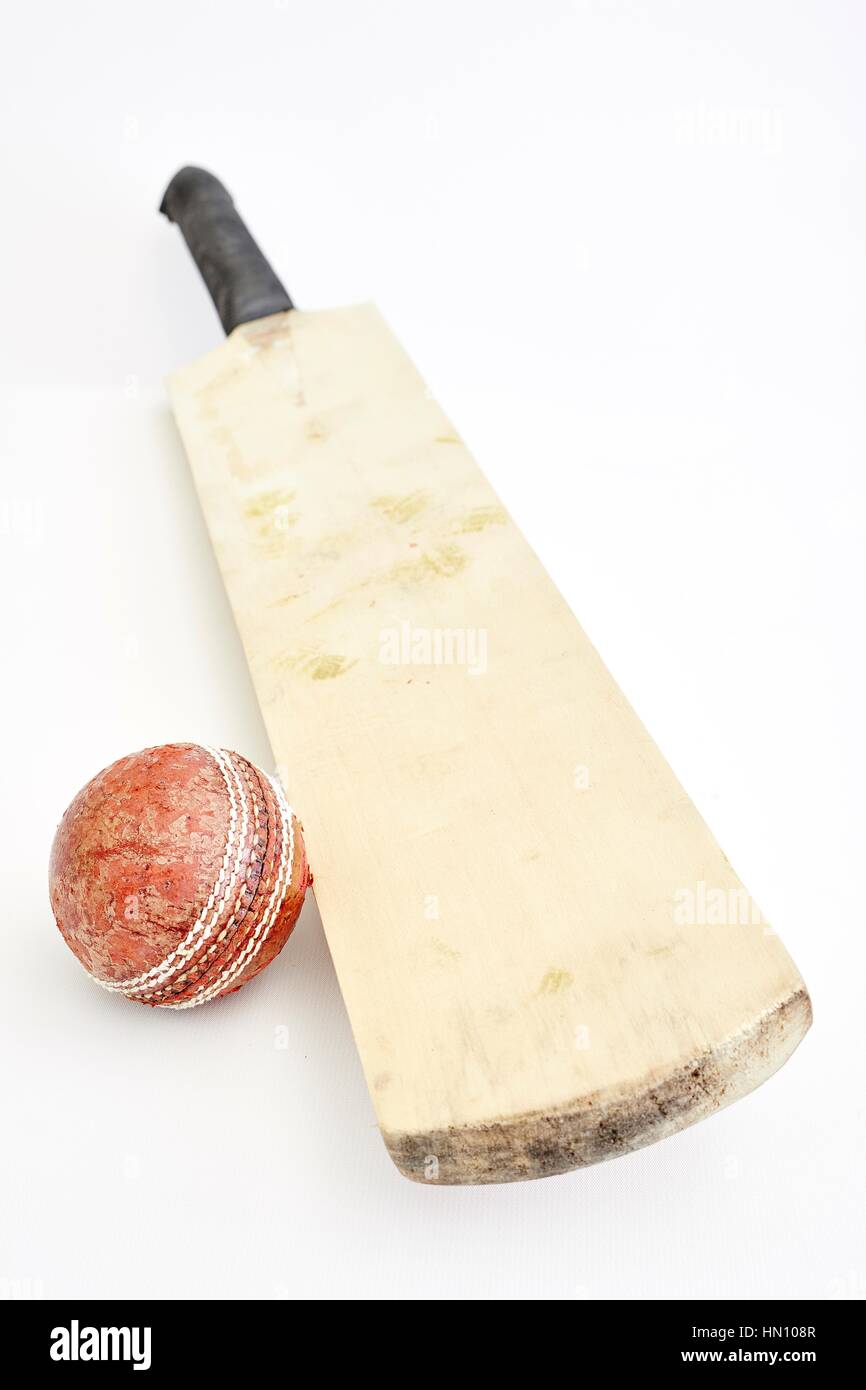 A studio photo of cricket gear on grass Stock Photo