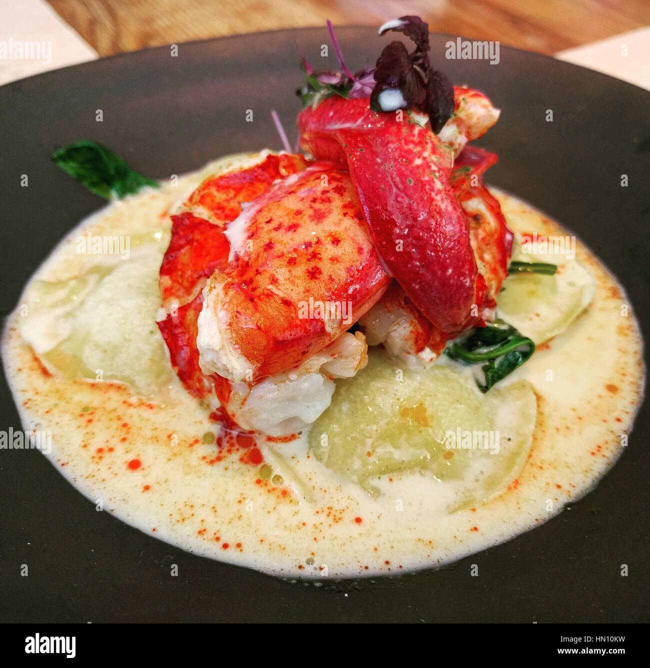 Butter poached lobster ravioli without shell for lunch and dinner Stock