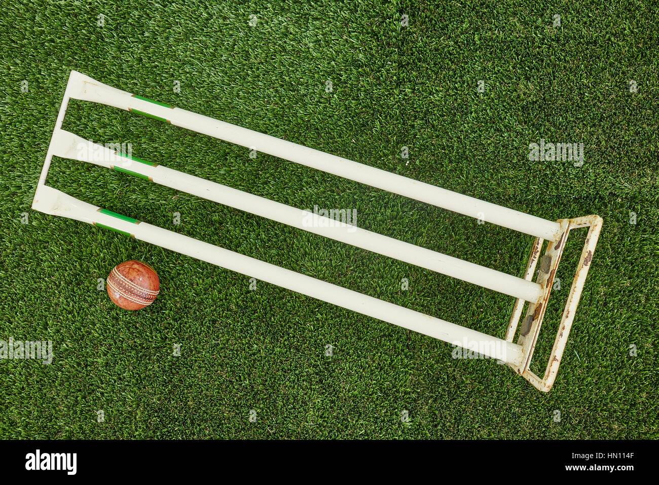 A studio photo of cricket gear on grass Stock Photo Alamy