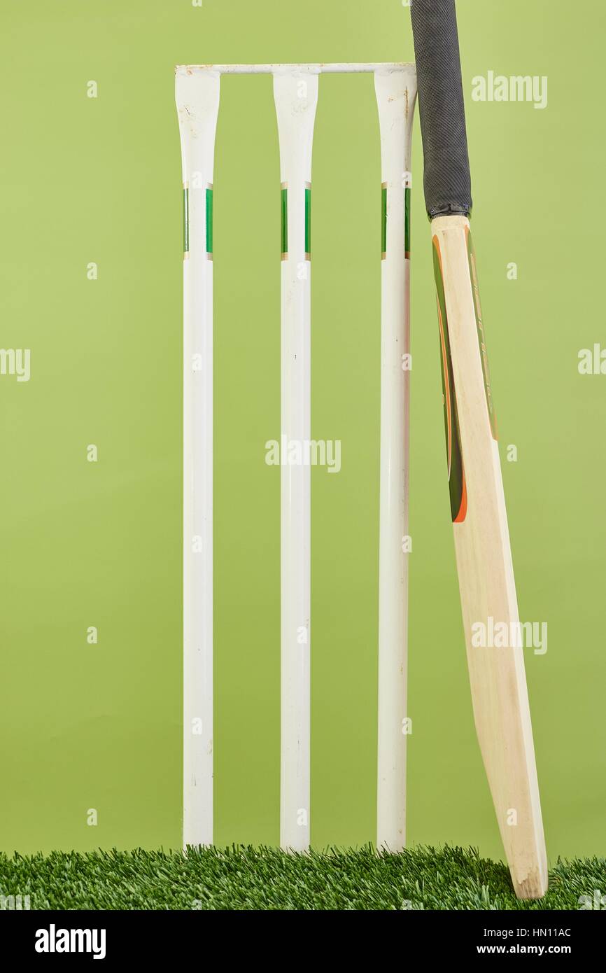 A studio photo of cricket gear on grass Stock Photo Alamy