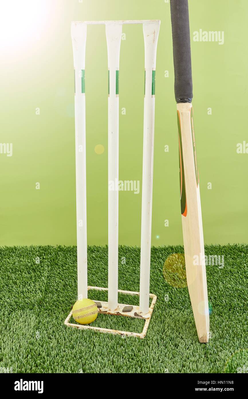 A studio photo of cricket gear on grass Stock Photo Alamy