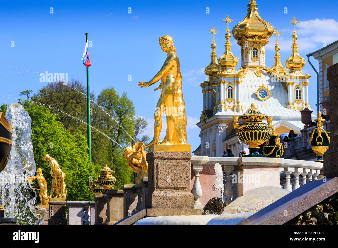 Gold statues and fountains of the grand cascade, Peterhof, St Petersburg, Russia Stock Photo