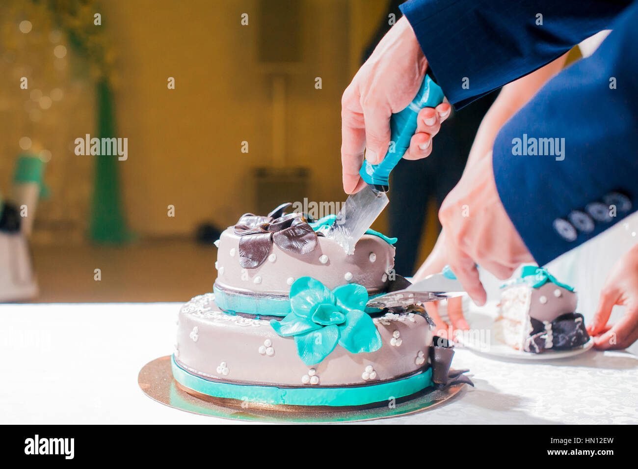 Husband And Wife The Couple Cut The Wedding Cake Knife Stock