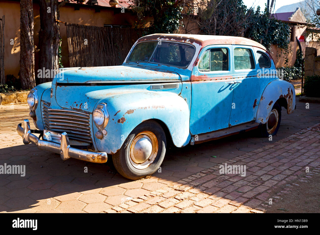 in south africa old abandoned american vintage car and  the house courtyard Stock Photo