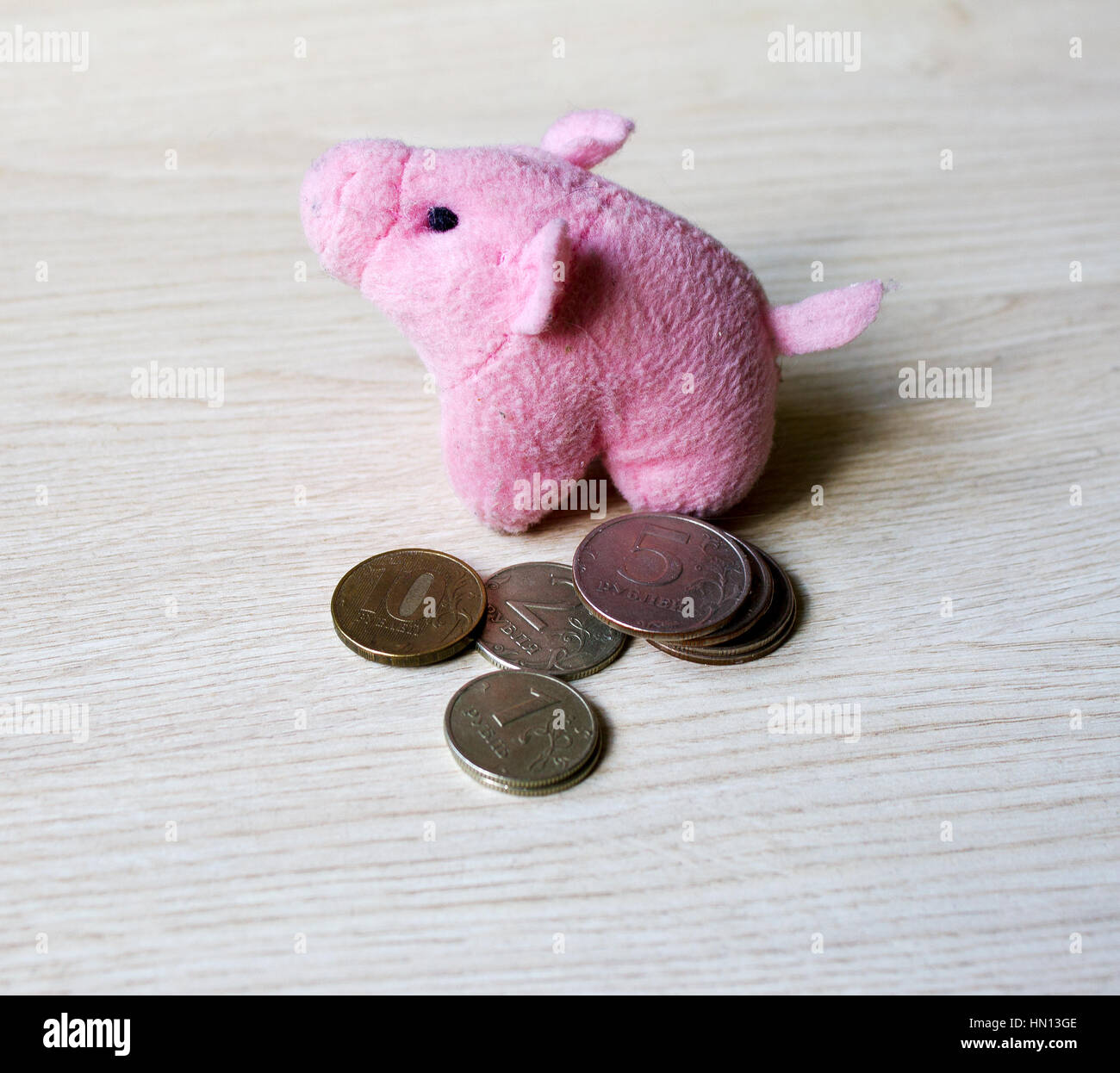 pink toy pig with coins, image can be used for original business ideas