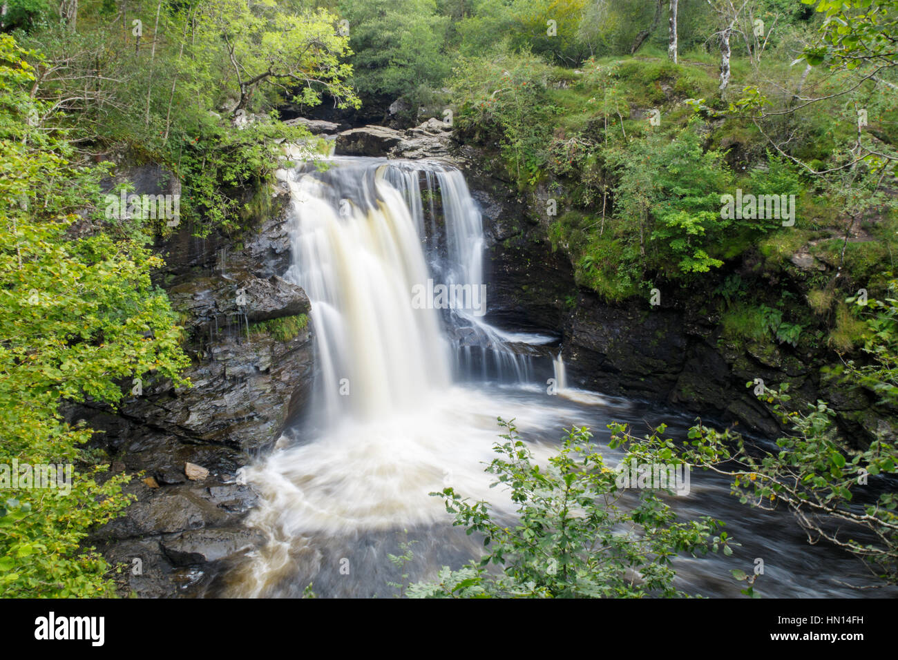 A long exposure photo of the beautiful Falls of Falloch in Scotland Stock Photo