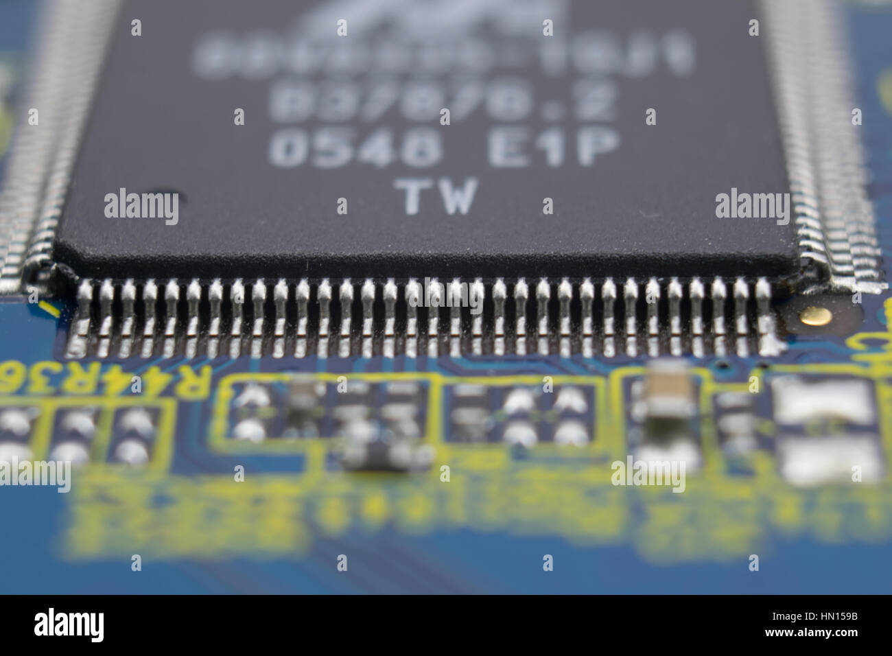 Close up of printed circuit board with big microchip and other ...