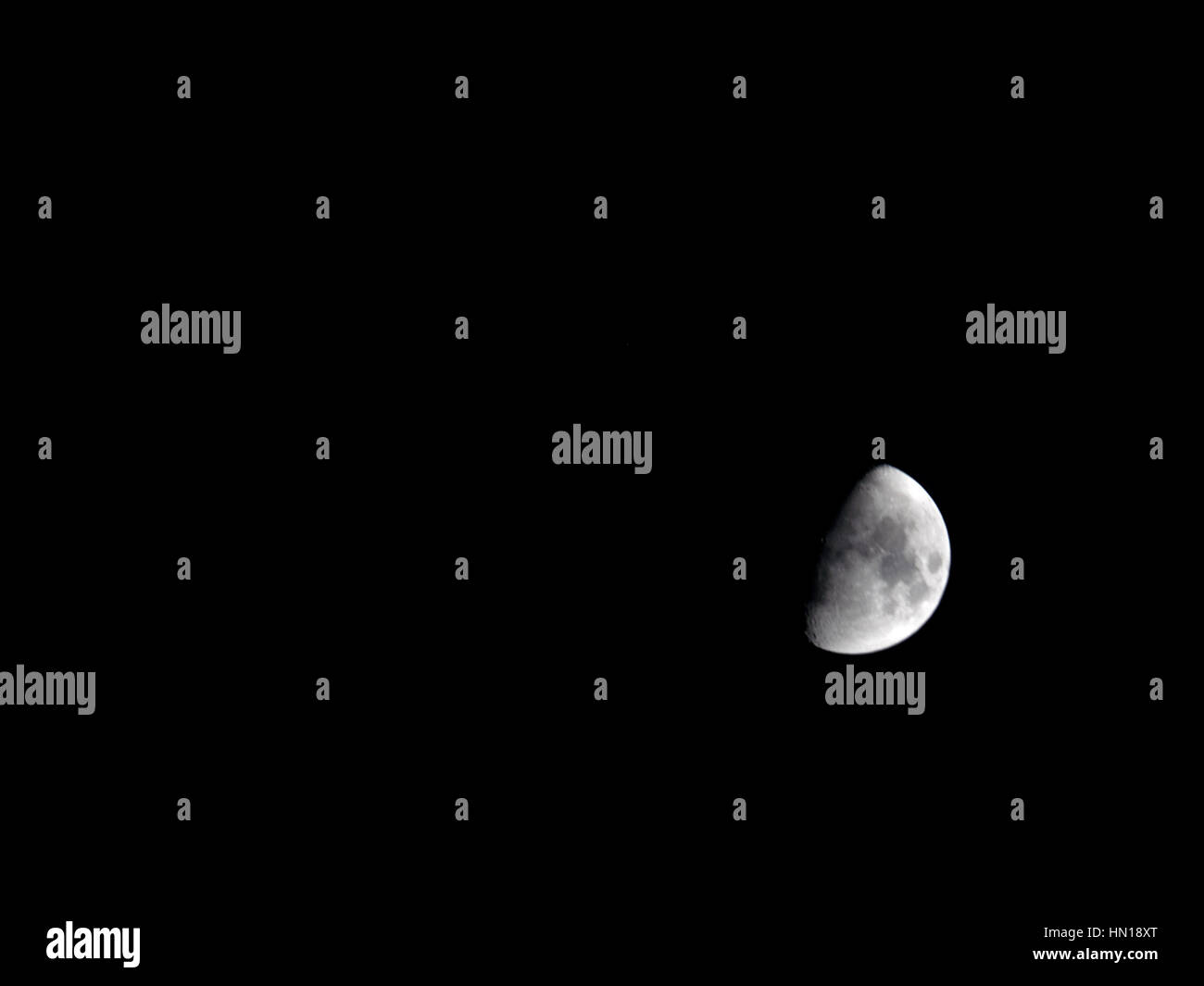 The moon seen from England on a clear February night. The moon is in the first quarter waxing
