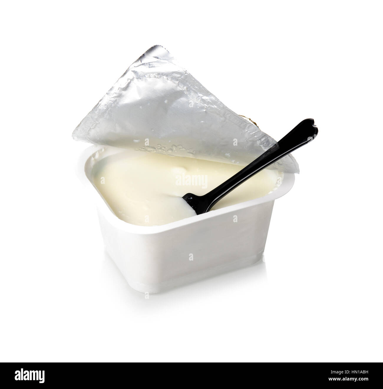 natural yogurt in white plastic container Stock Photo Alamy