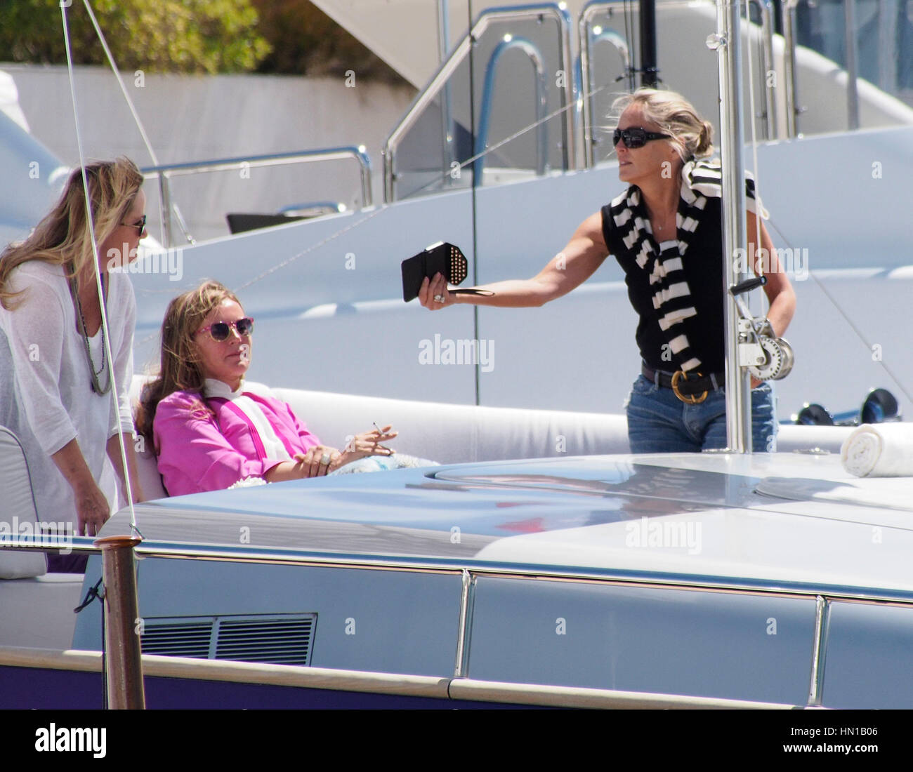Sharon Stone on the Roberto Cavalli yacht in the harbor at the 66th
