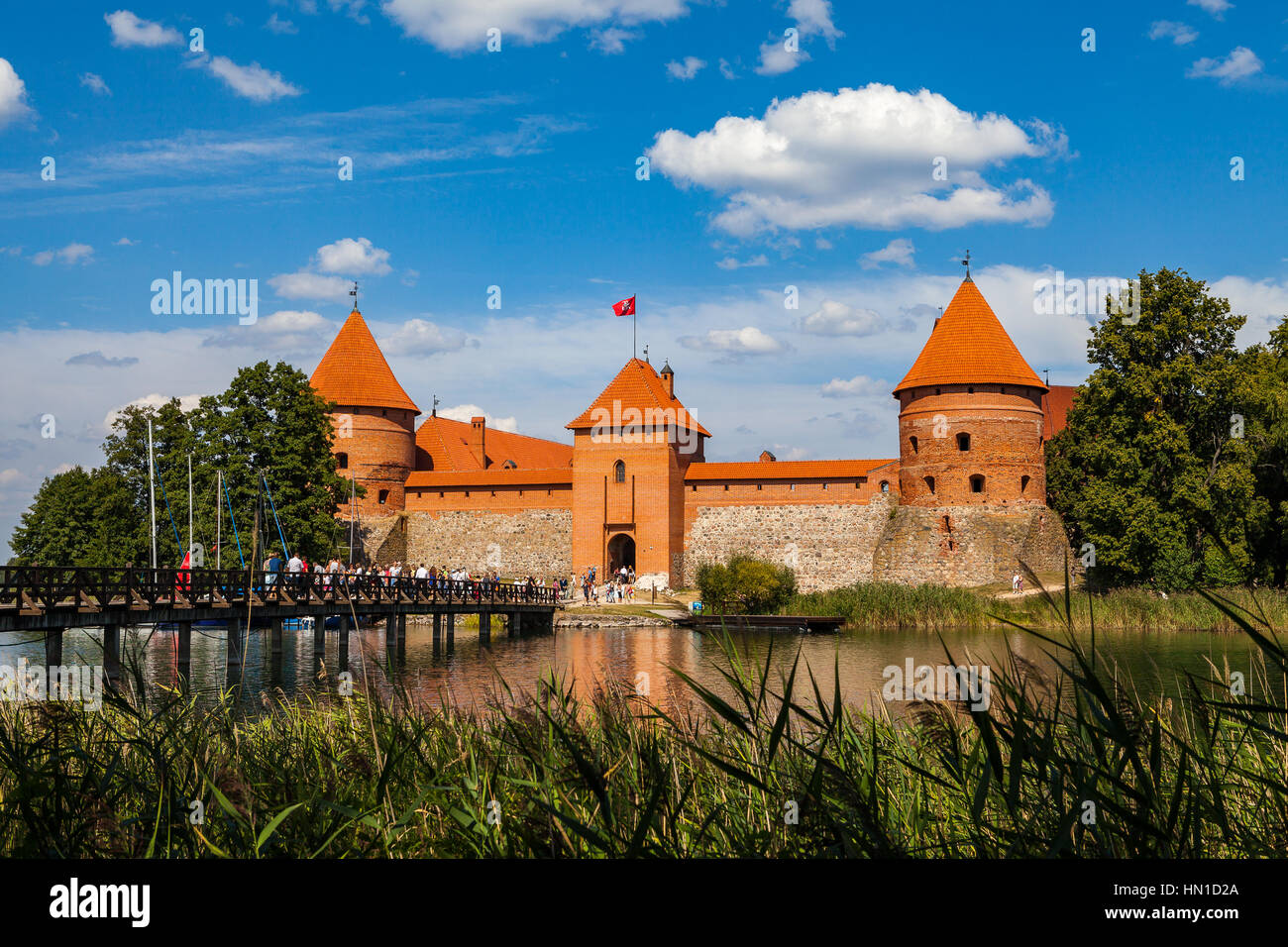 TRAKAI, LITHUANIA - 22 AUG 2015: Galves lake, Trakai old red bricks castle view. Stock Photo