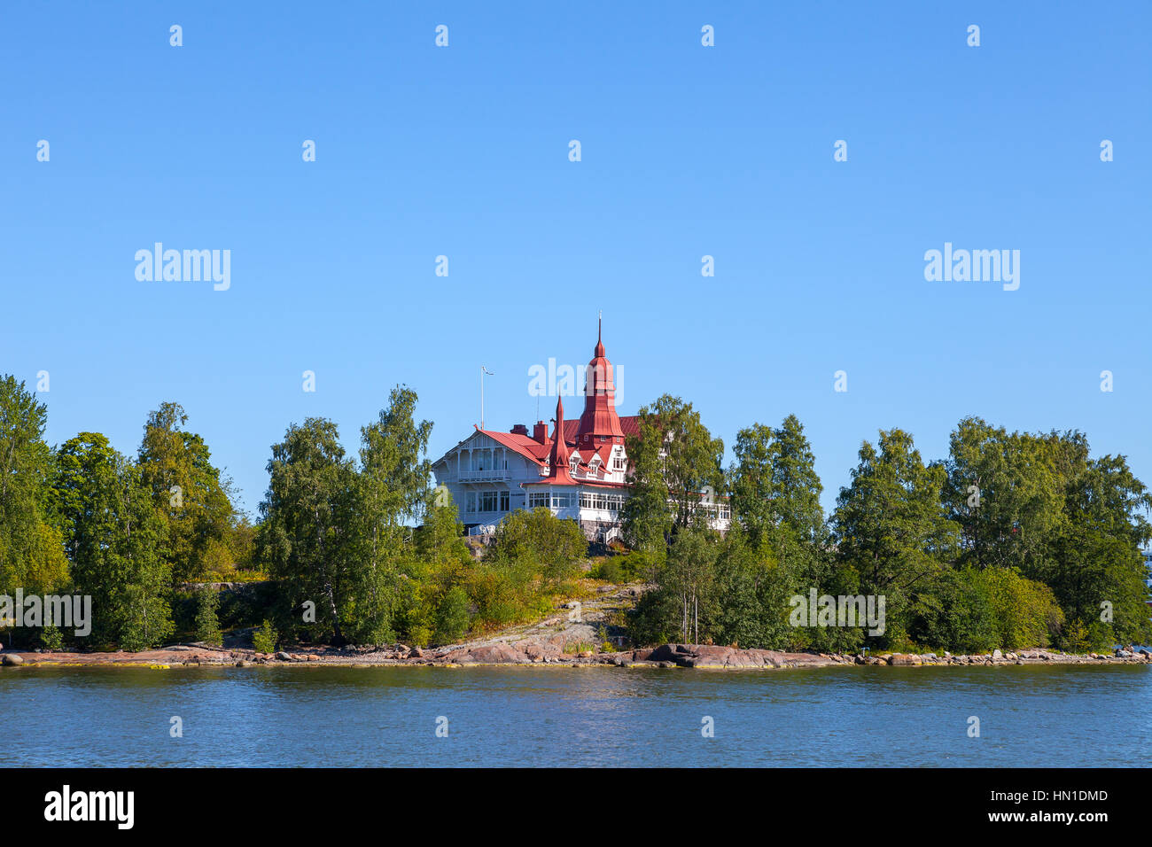 Helsinki. Luoto Island in the summer. Cosy wooden building on the green island Stock Photo