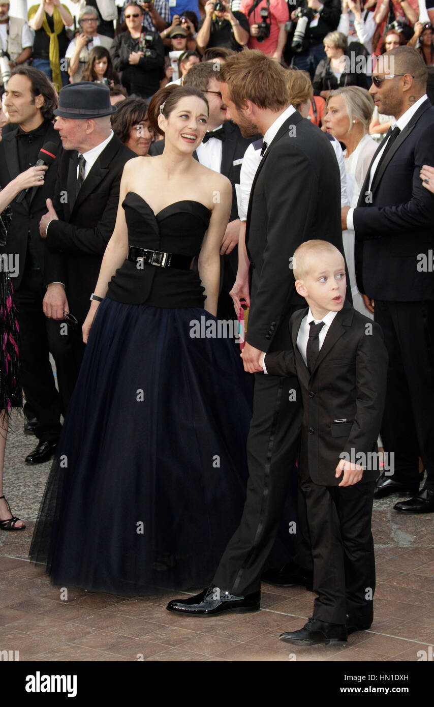 Marion Cotillard,left, Matthias Schoenaerts and child actor Armand Verdure  at the premiere for the film, "De rouille et d'os" at the 65th Cannes Film  Festival in Cannes, France on May 17, 2012.