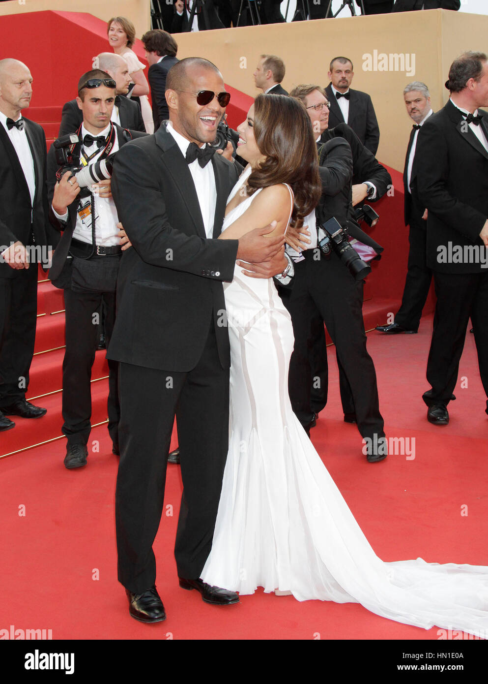 Eva Longoria hugs Amaury Nolasco at the premiere for the film, 'De rouille et d'os' at the 65th Cannes Film Festival in Cannes, France on May 17, 2012. Photo by Francis Specker Stock Photo