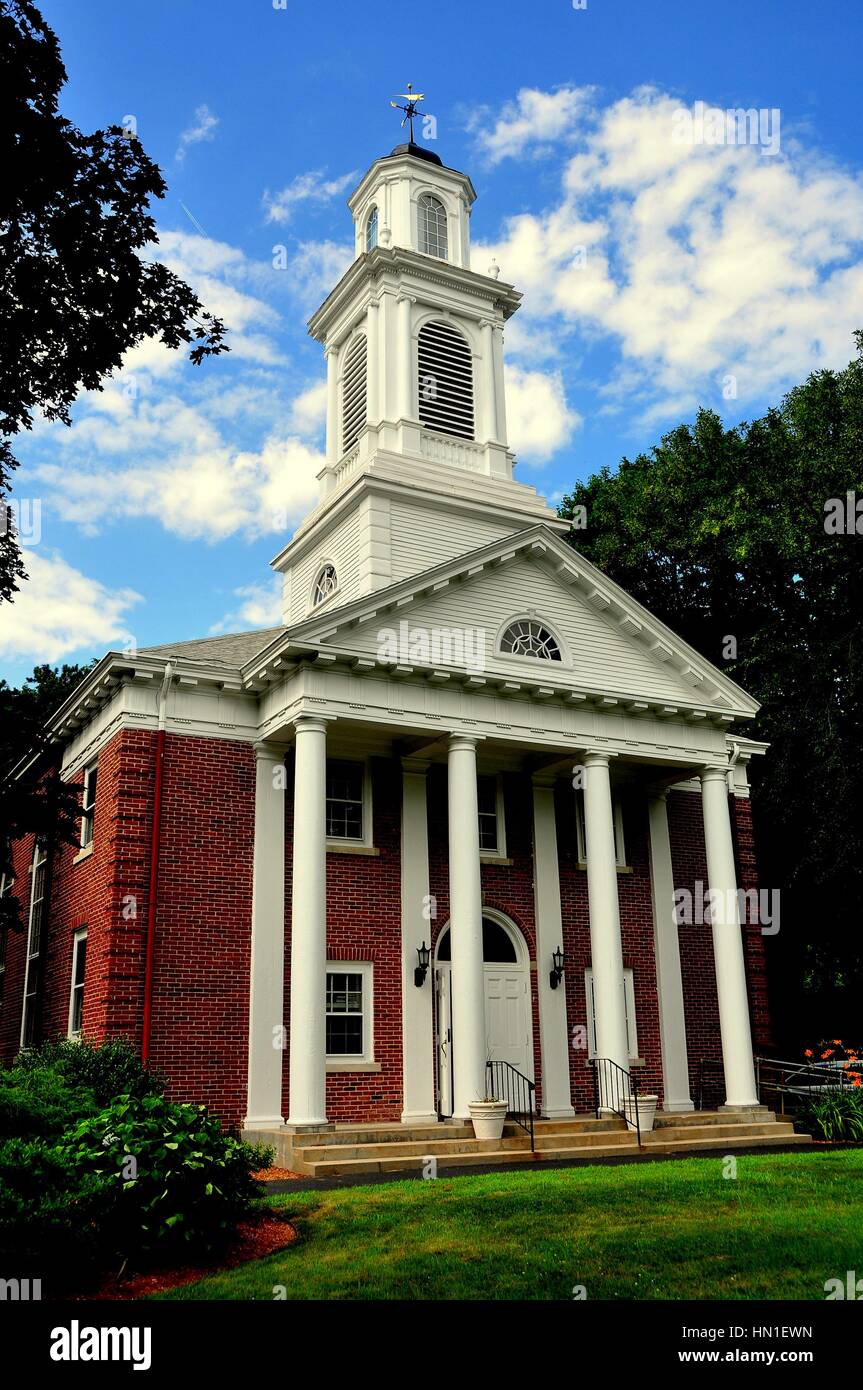 Weston, Massachusetts - July 14, 2013:  Colonial-style First Baptist Church with columned portico and steeple topped with a cupola Stock Photo