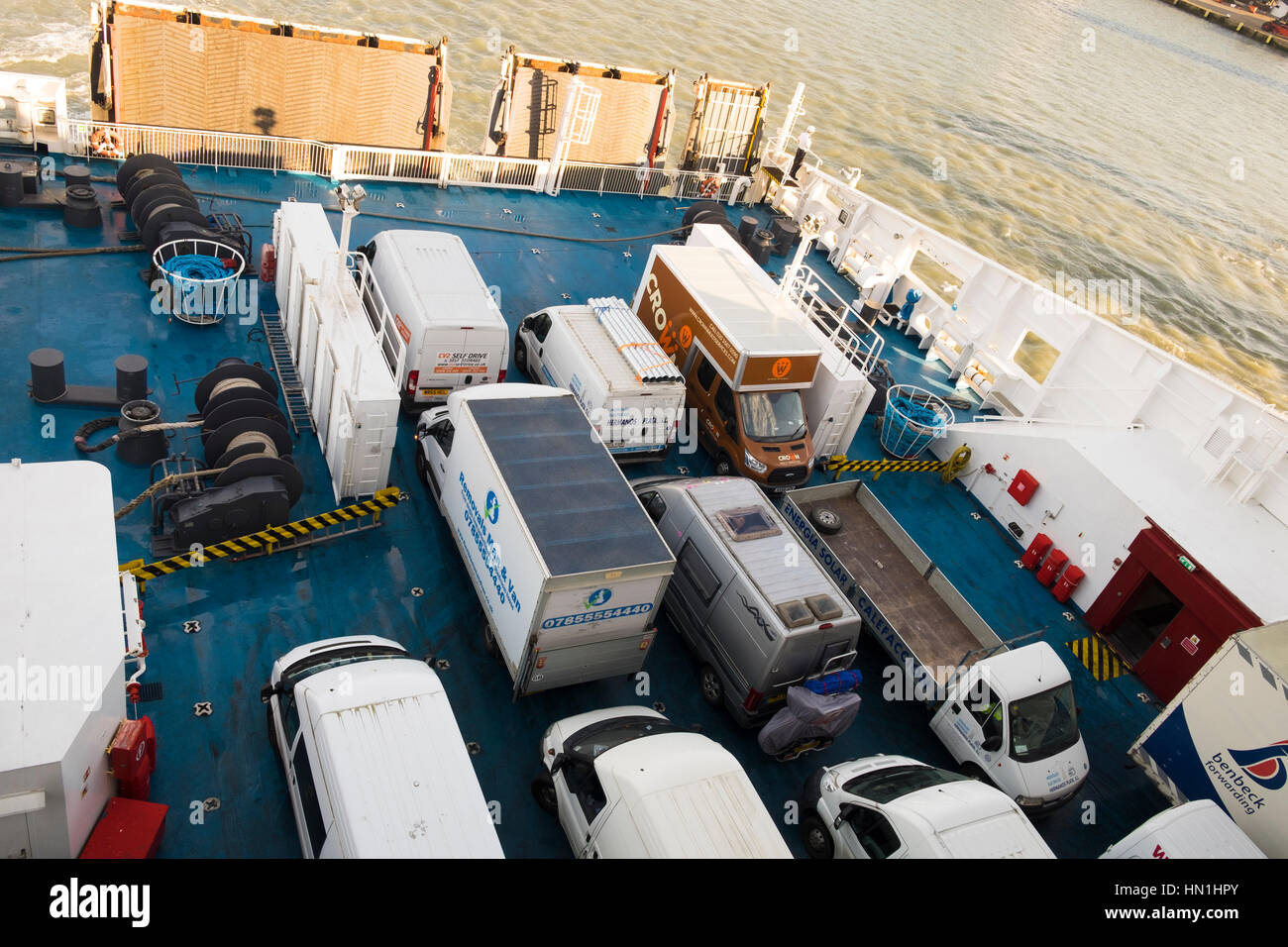The rear deck of a car ferry loaded with vehicles looking down Stock Photo