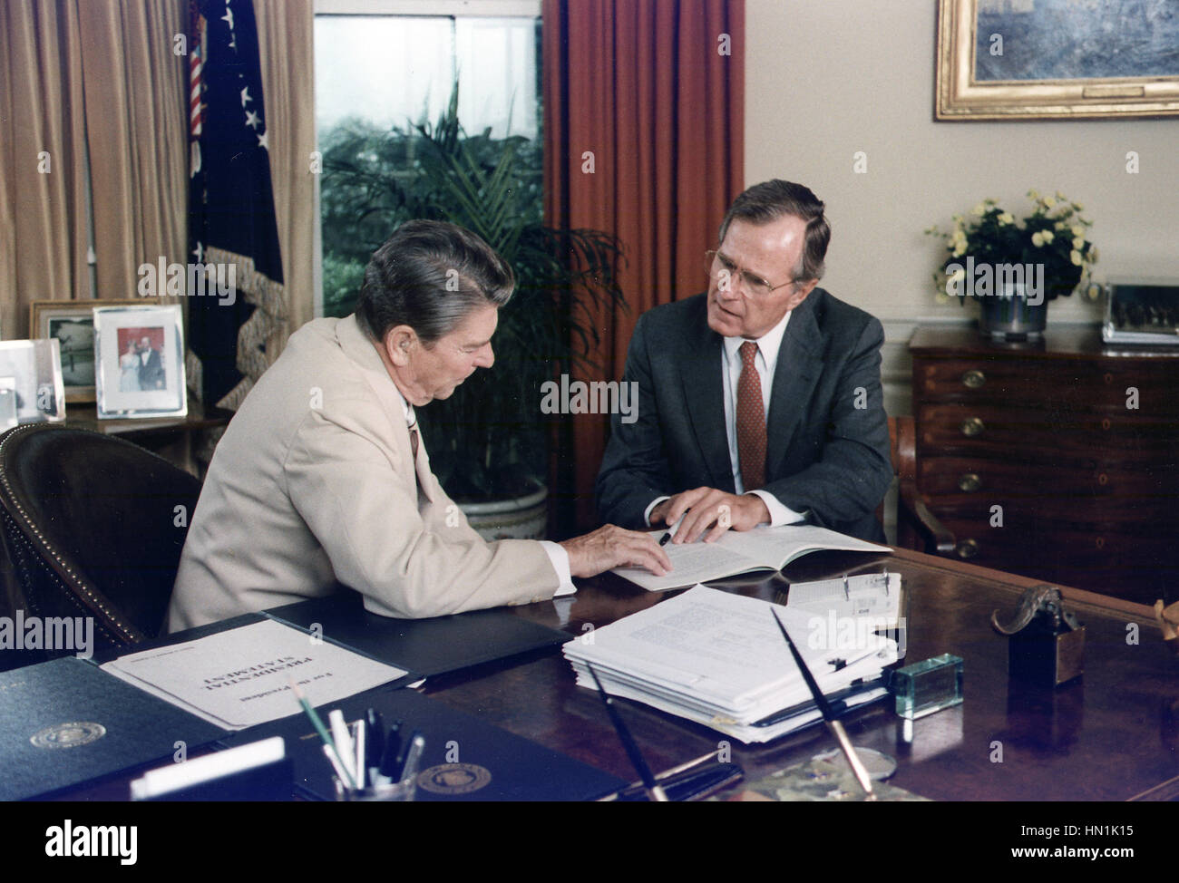 PRESIDENT RONALD REAGAN at left with Vice President H.W.Bush in the Oval Office of the White House on 20 July 1984. Photo: White House Official Stock Photo
