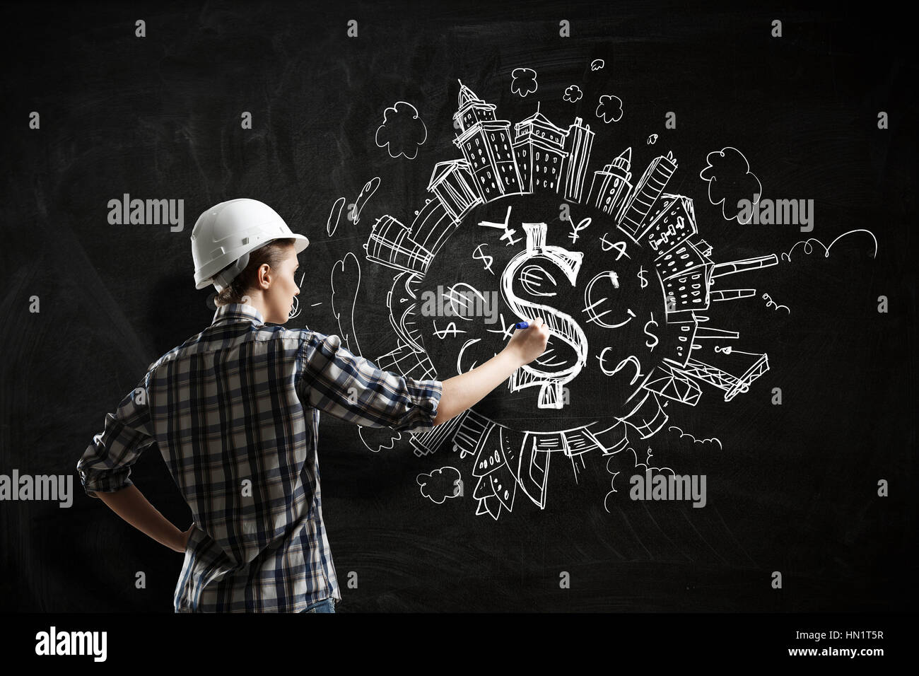 Rear view of engineer woman drawing construction plan Stock Photo - Alamy