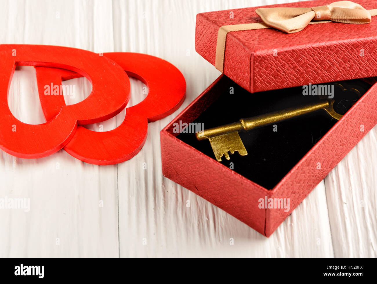 Gift by St. Valentine's Day in a red box on a white background Stock Photo