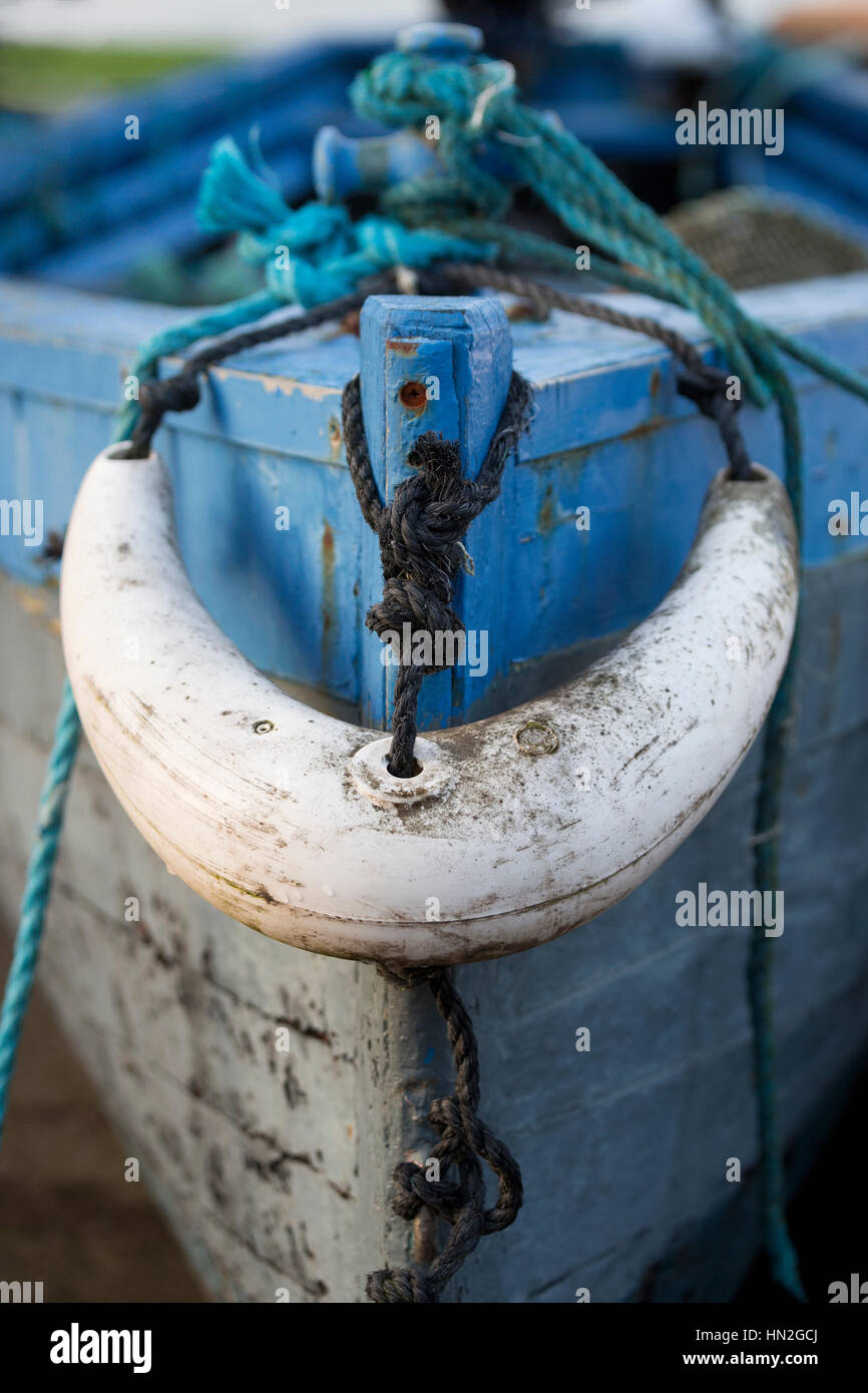 Creasecent shaped fender on bow of sailing boat, Portmagee, Ireland Stock Photo