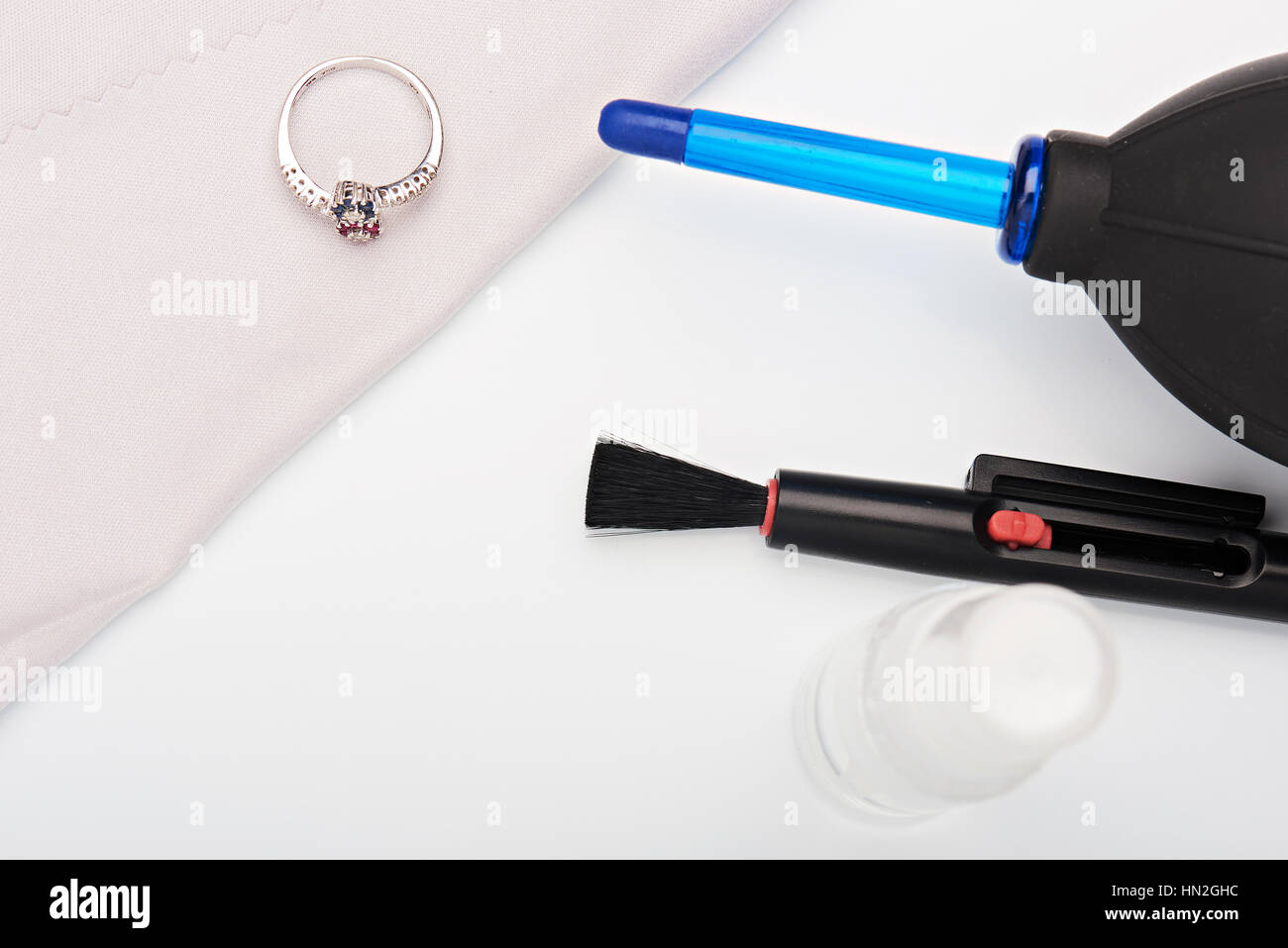 gold ring after cleaning lay on cloth with tools Stock Photo Alamy