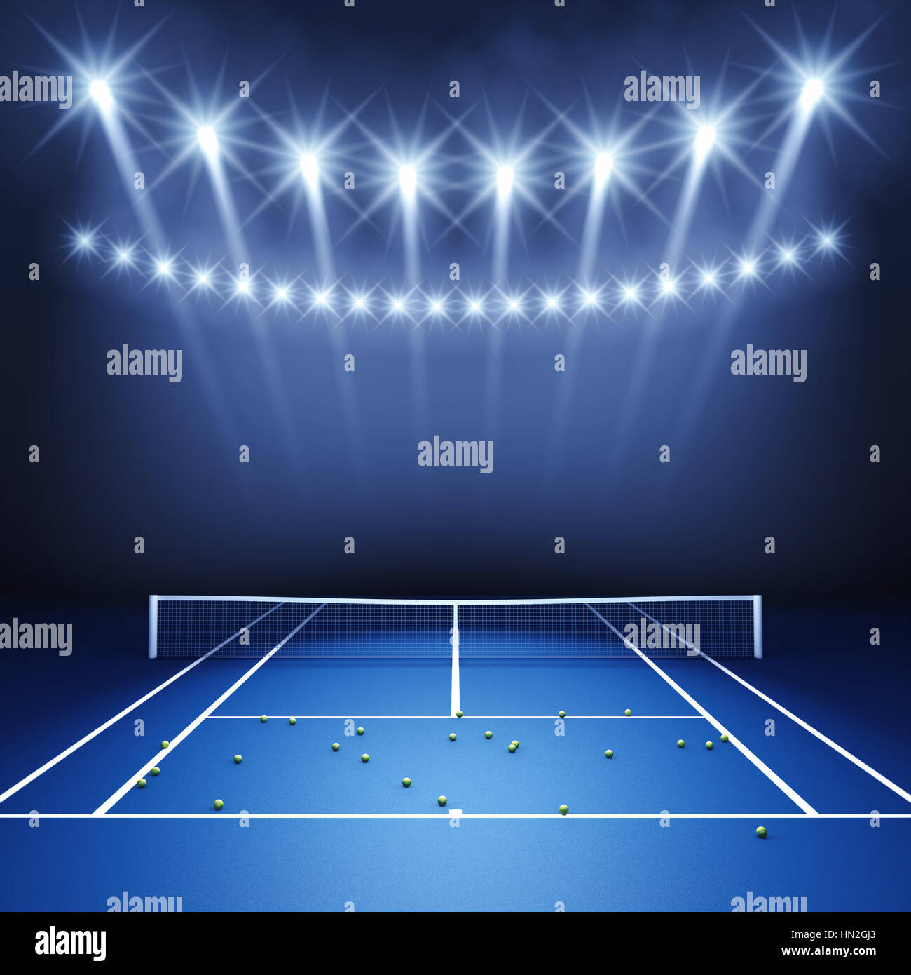 Blue tennis hard court illuminated by spotlights , Tennis tournament arena Stock Photo