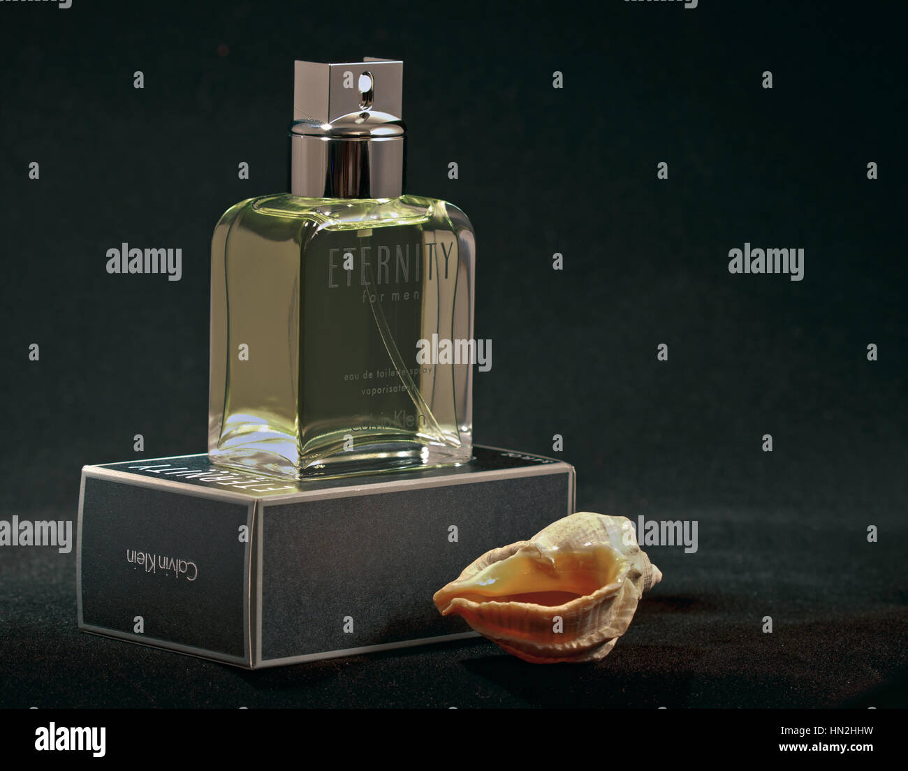 Calvin Klein Eternity fragrance for men bottle and pack against black  background Stock Photo - Alamy
