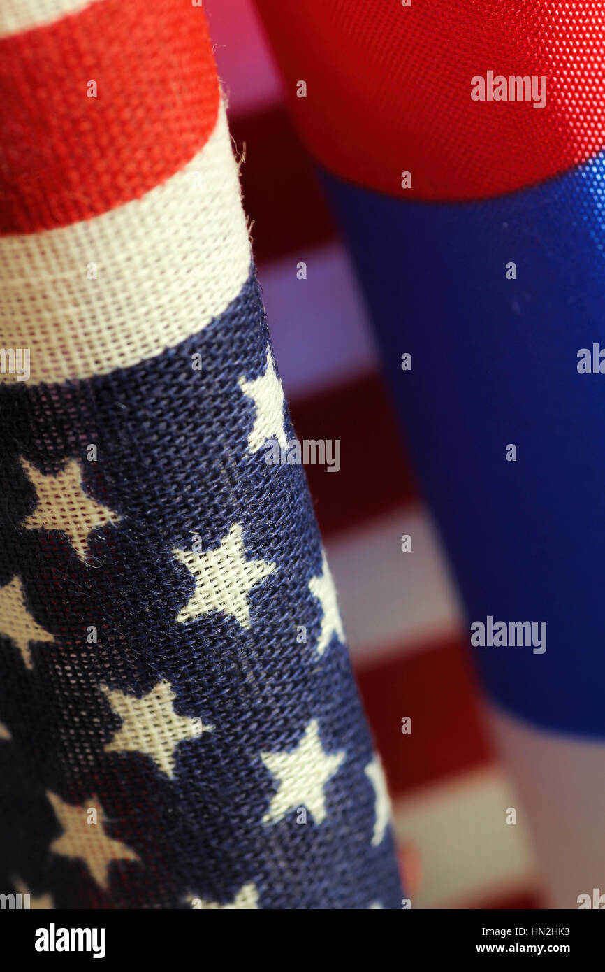 american flag and russian flag side by side and head to head on a light background Stock Photo