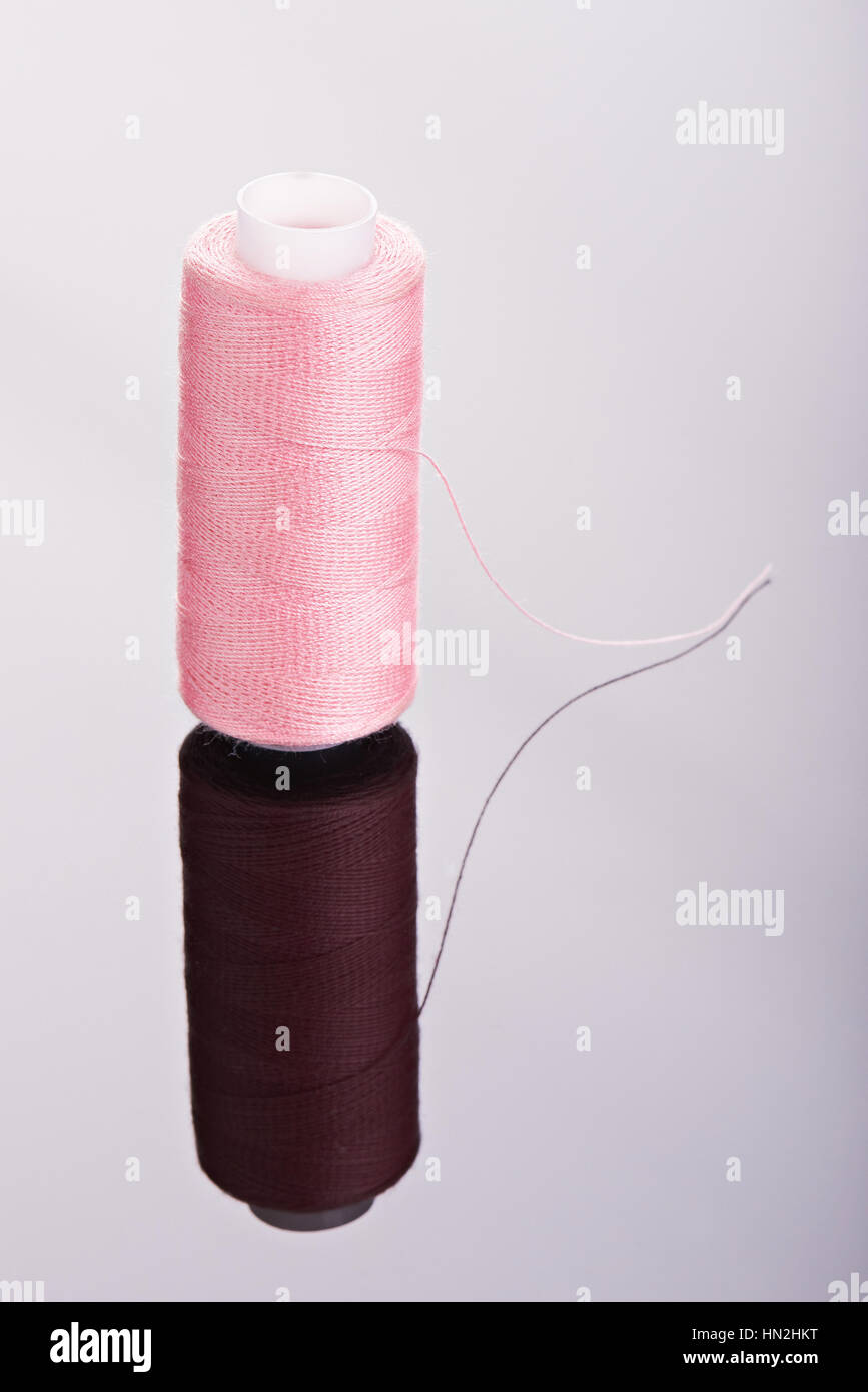 Two Spools of Pink Thread with Needle Stock Photo - Image of point, thread:  16914692