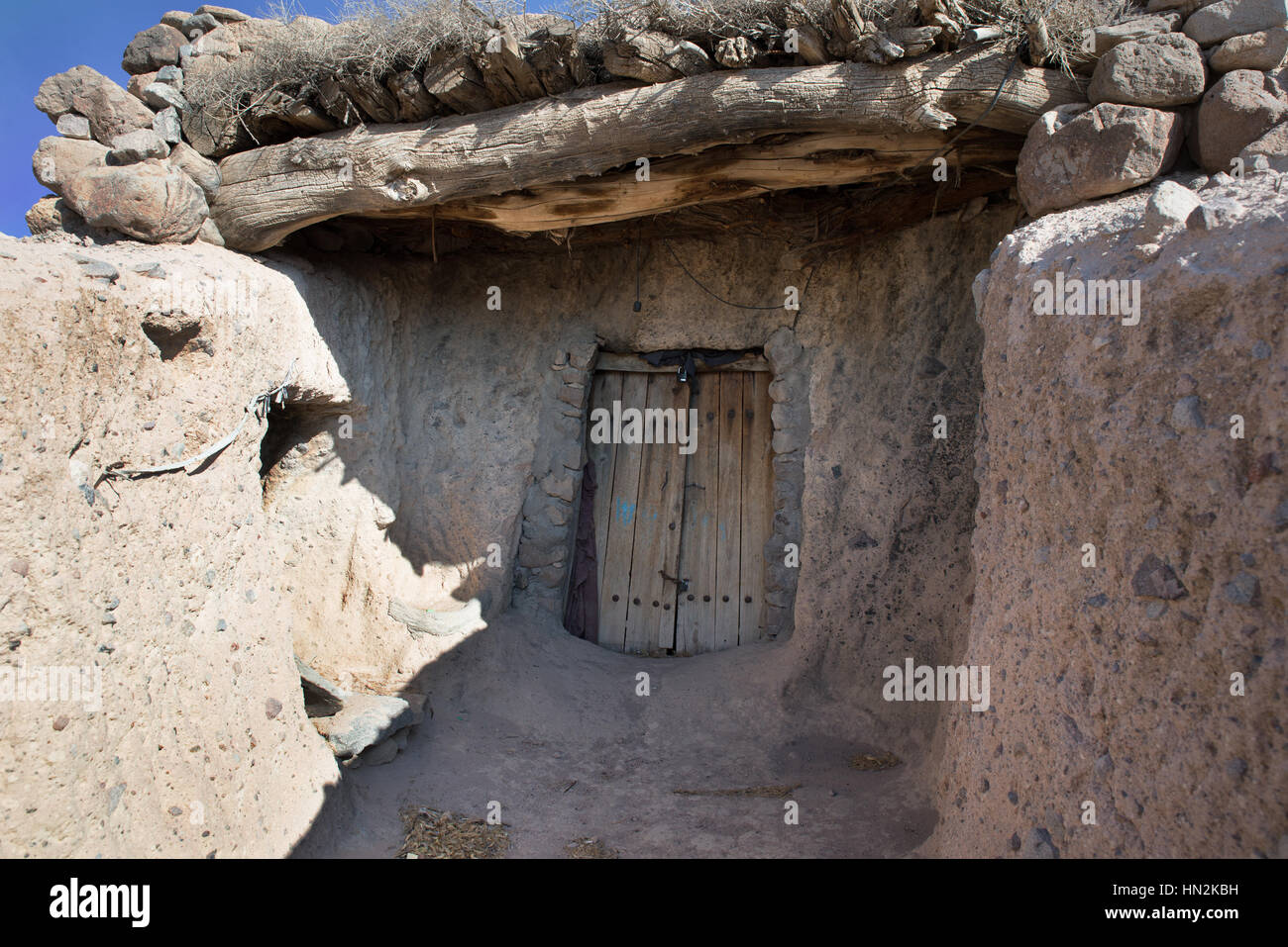 The door of a hand-dug houses amid the rocks, Maymand, Iran Stock Photo -  Alamy