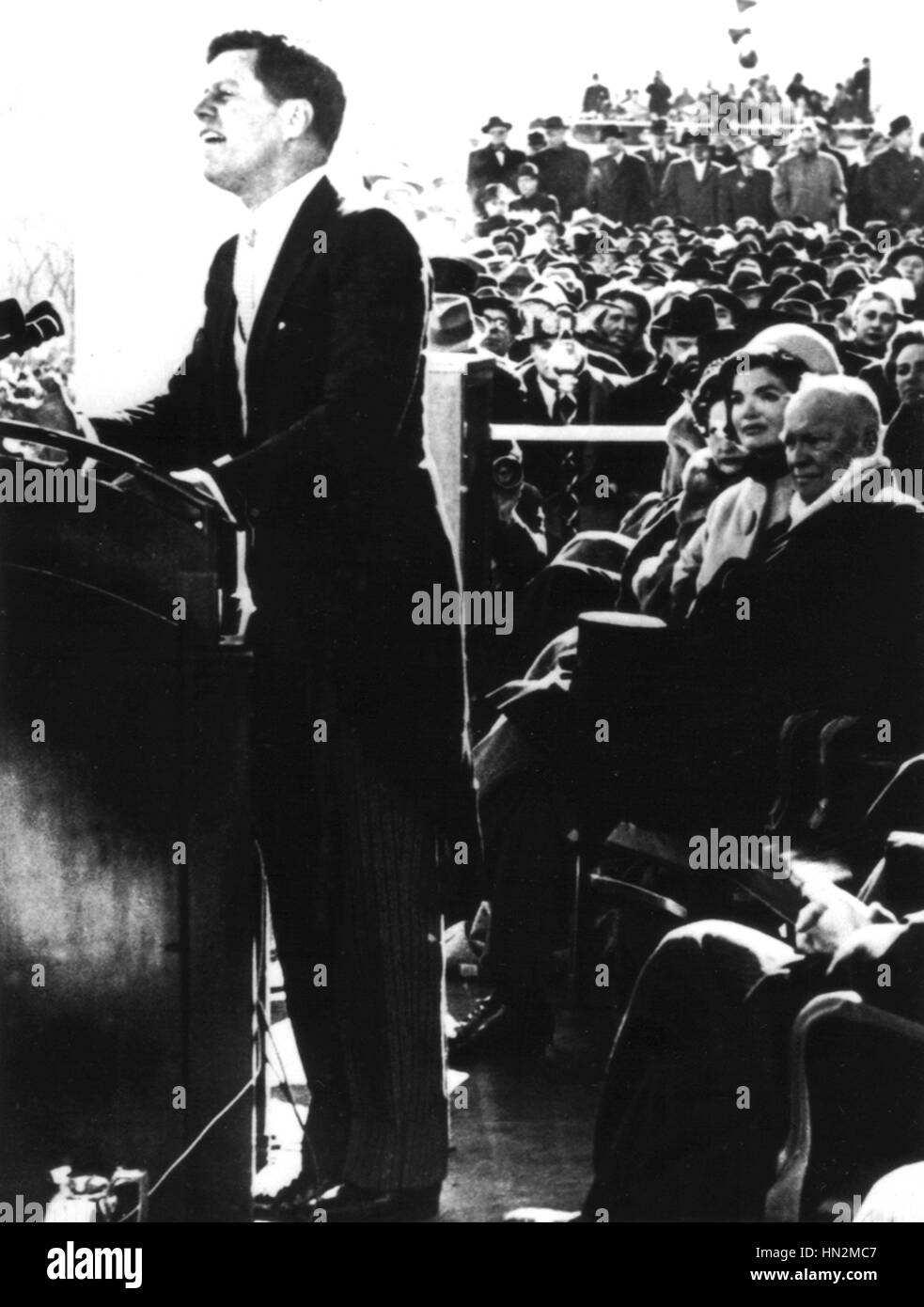 John Kennedy's Inaugural speech (behind him, Jacqueline Kennedy and Eisenhower) January 20, 1961 United States National archives. Washington Stock Photo