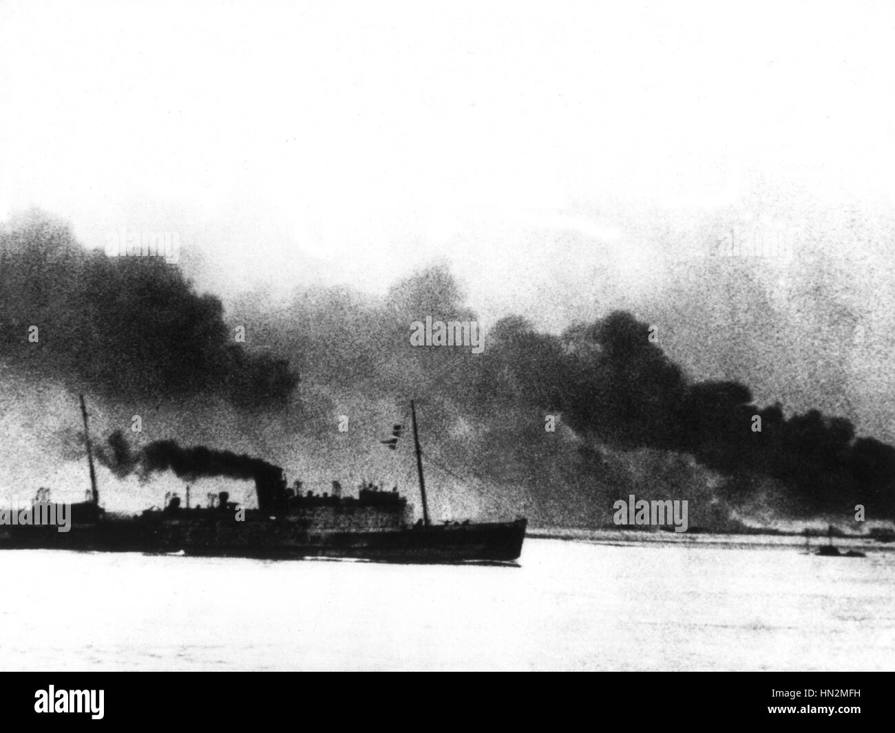 British boats on fire off Dunkirk June 1940 France - World War II Washington, National archives Stock Photo