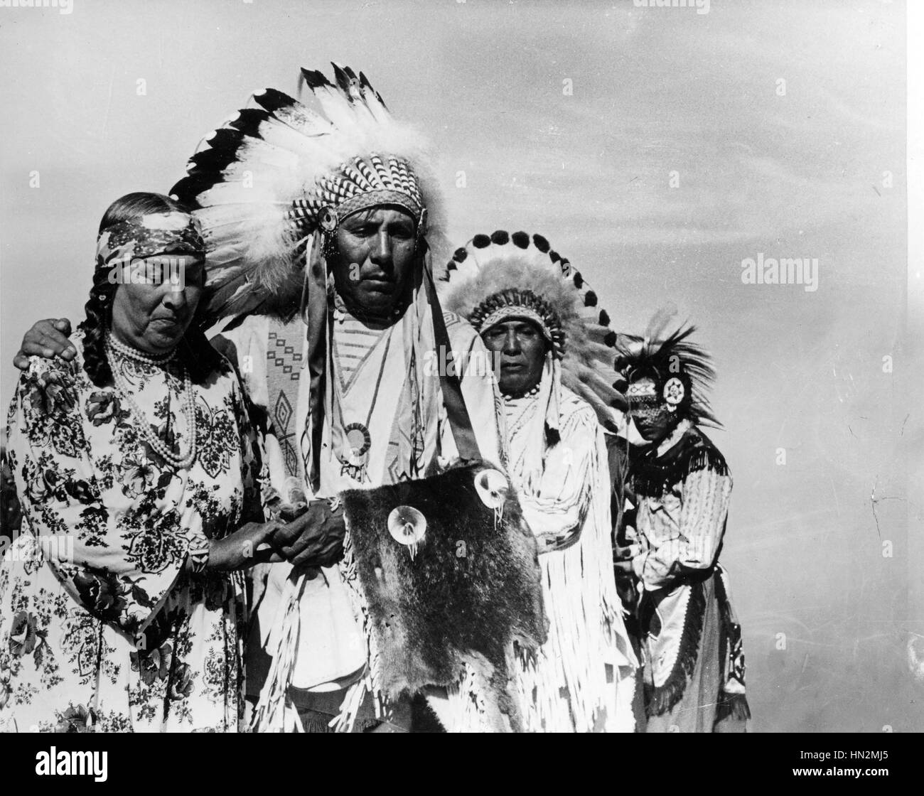 The Canadian indians: A band from Carlston Alberta playing the Sun Dance Photograph by Gar Lanney 20th century Canada National film board of Canada Stock Photo