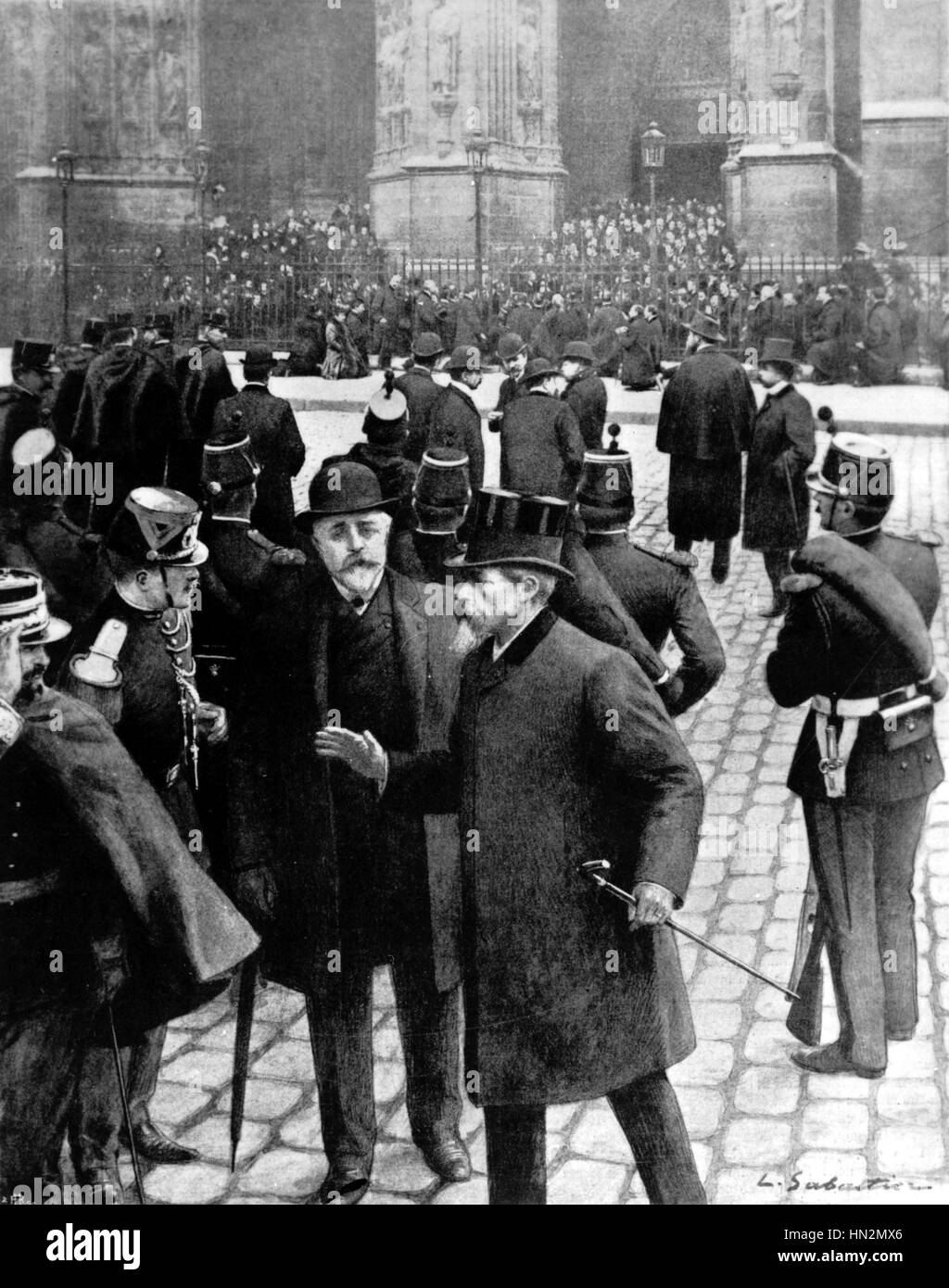 France Separation of church and state. In front of Ste. Clotilde: Mr Lepine, police chief, and Mr Touny give orders to agents while people pray and sing. 1906 Stock Photo