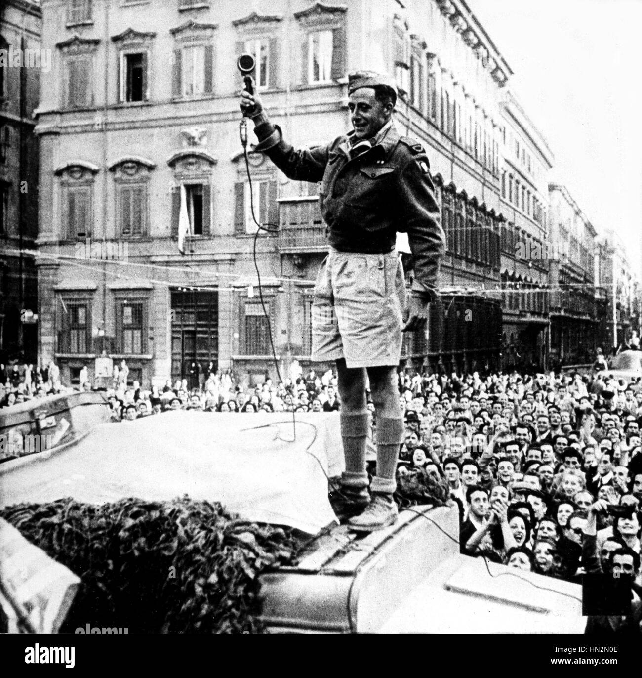 BBC war correspondent Godfrey Talbot makes a recording in liberated Rome on 5 June 1944. London, Imperial War Museum Stock Photo
