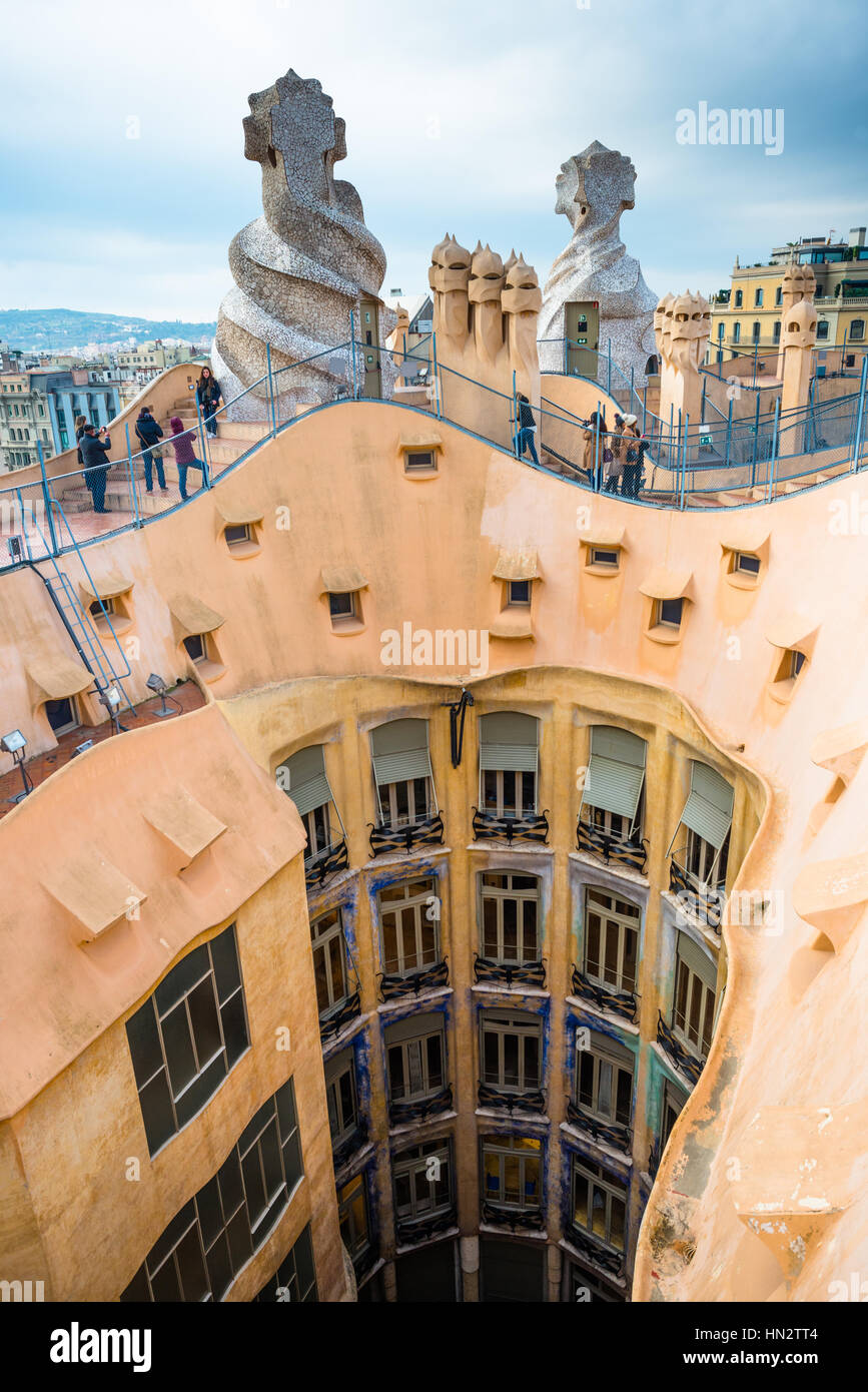 Barcelona, Guadi's The Pedrera (Casa Mila) on the roof with its unusual chimneys, Catalonia, Spain Stock Photo